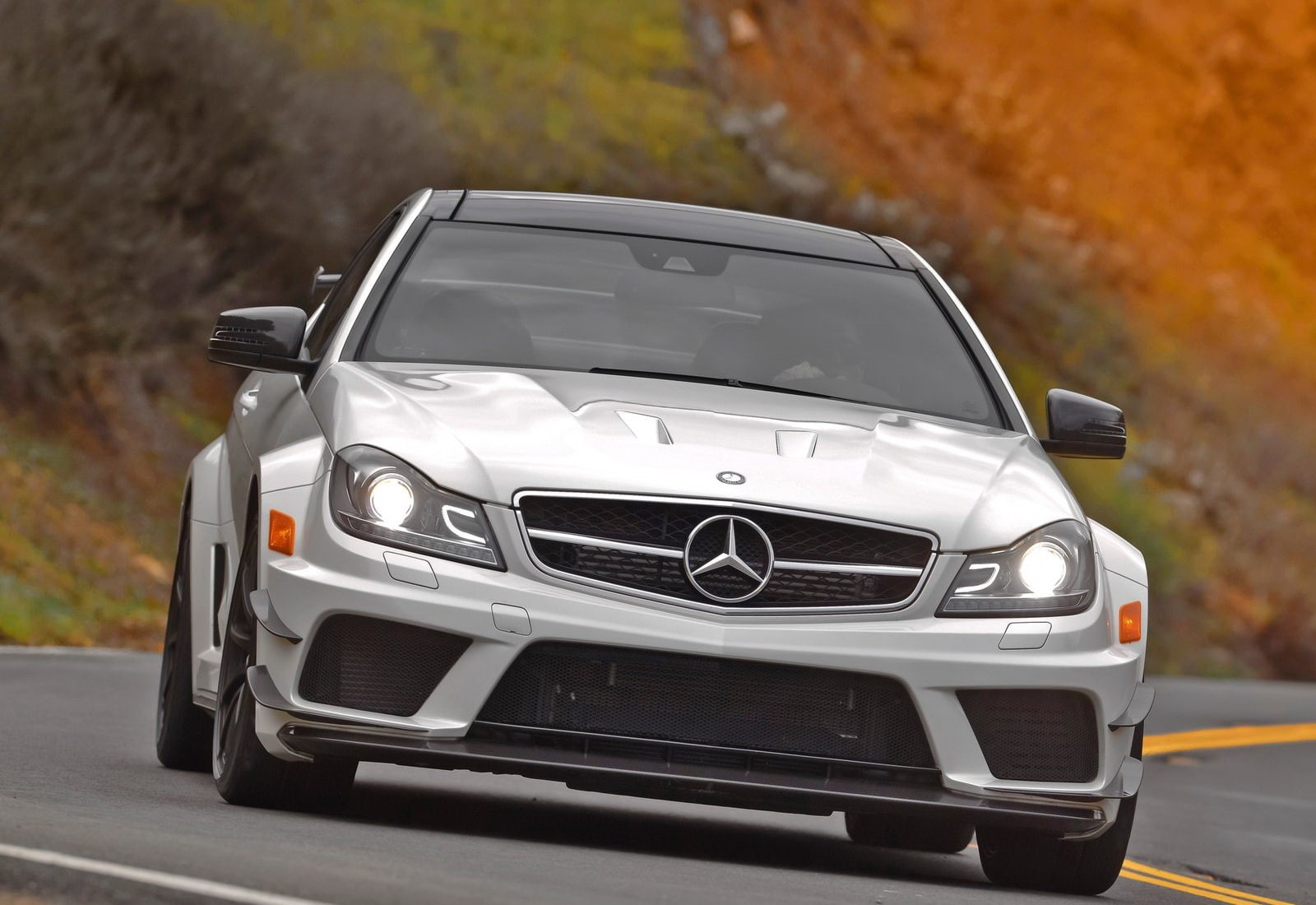road, street, car, headlight, nature, day, series, c63, city, coupe, close-up, motor vehicle, 720P, mode of transportation, mercedes-benz, stationary, HD Wallpaper