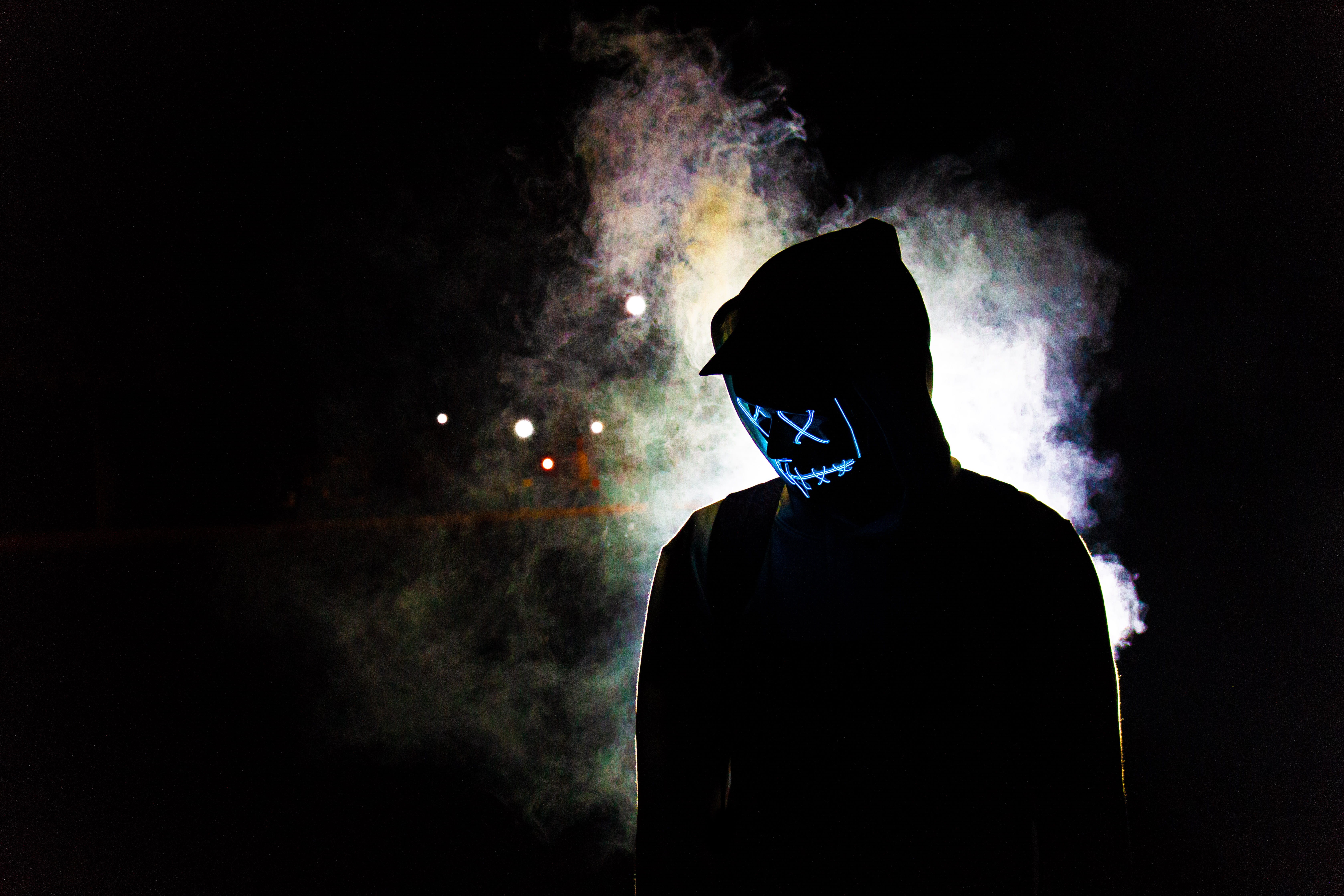 illuminated, 5K, depression - sadness, waist up, led lights, headshot, smoky, fog, one person, darkness, standing, black background, male, mist, cap, mask, HD Wallpaper