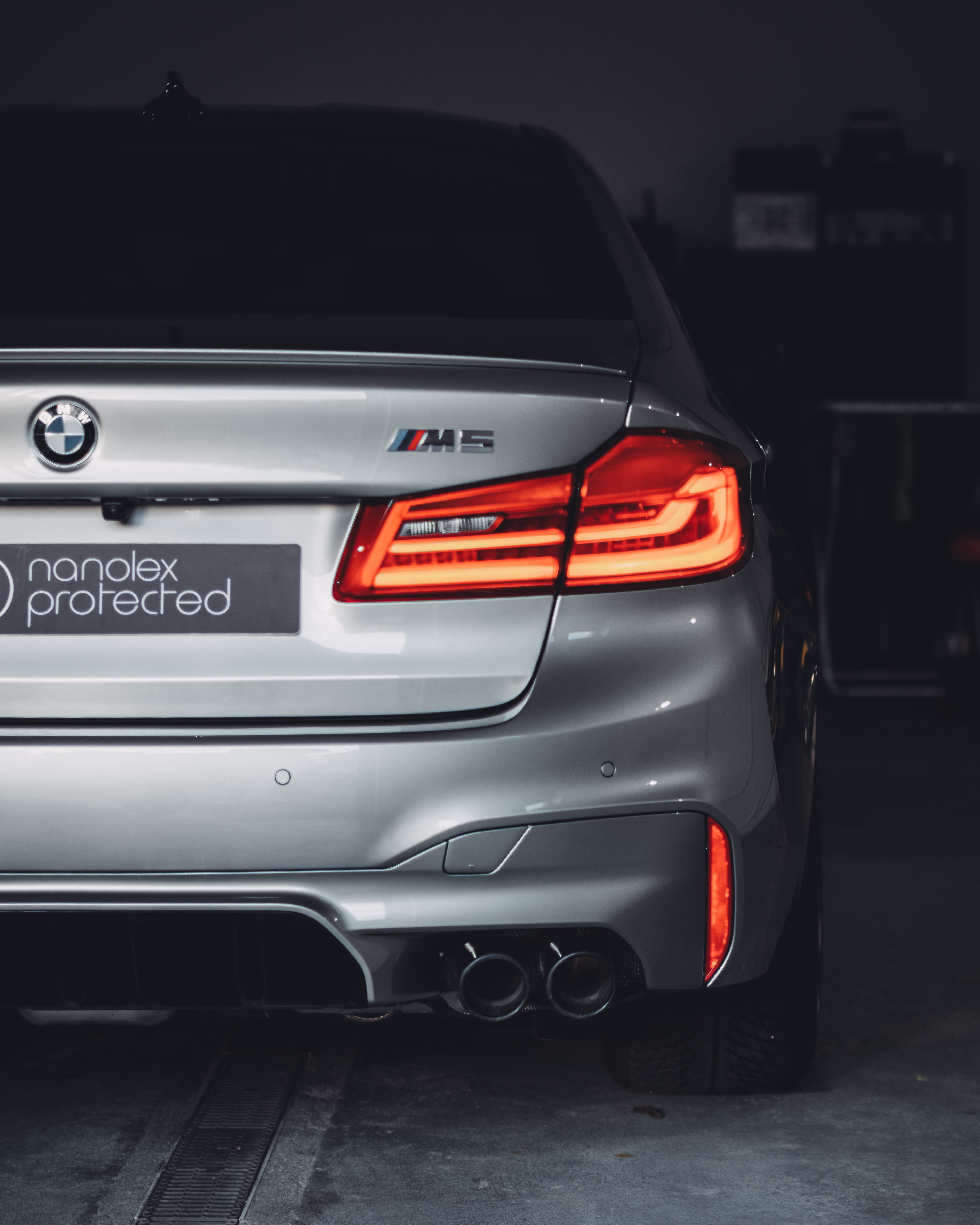 slovakia, 4K, car wheel, tail light, night, mode of transportation, automobile, garage, text, communication, bmw m, automotive, red, m performance, bmw, Phone HD Wallpaper
