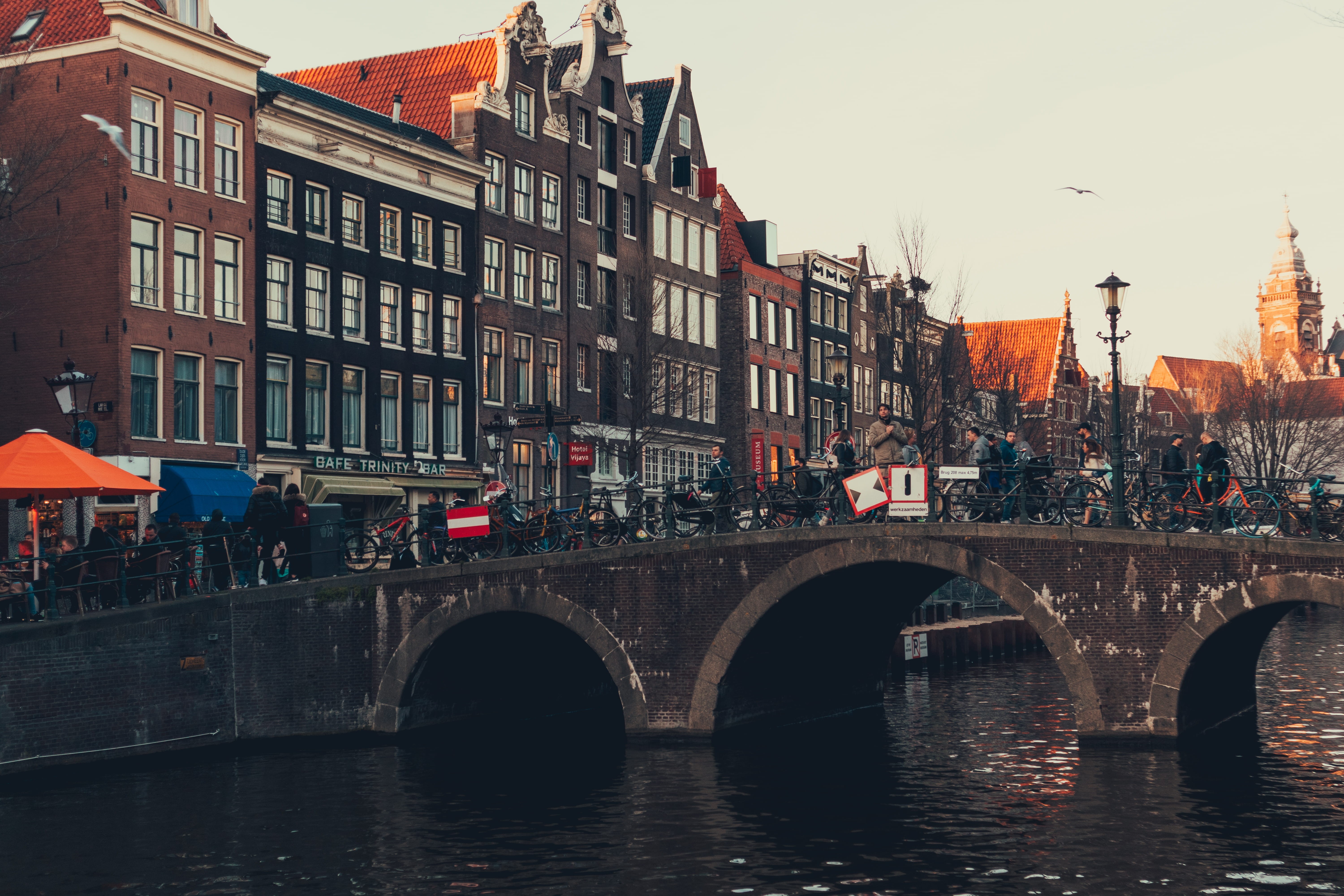 people, group of people, vehicle, fort, incidental people, waterfront, bridge - man made structure, buildings, brick, town, vessel, built structure, transportation, HD Wallpaper