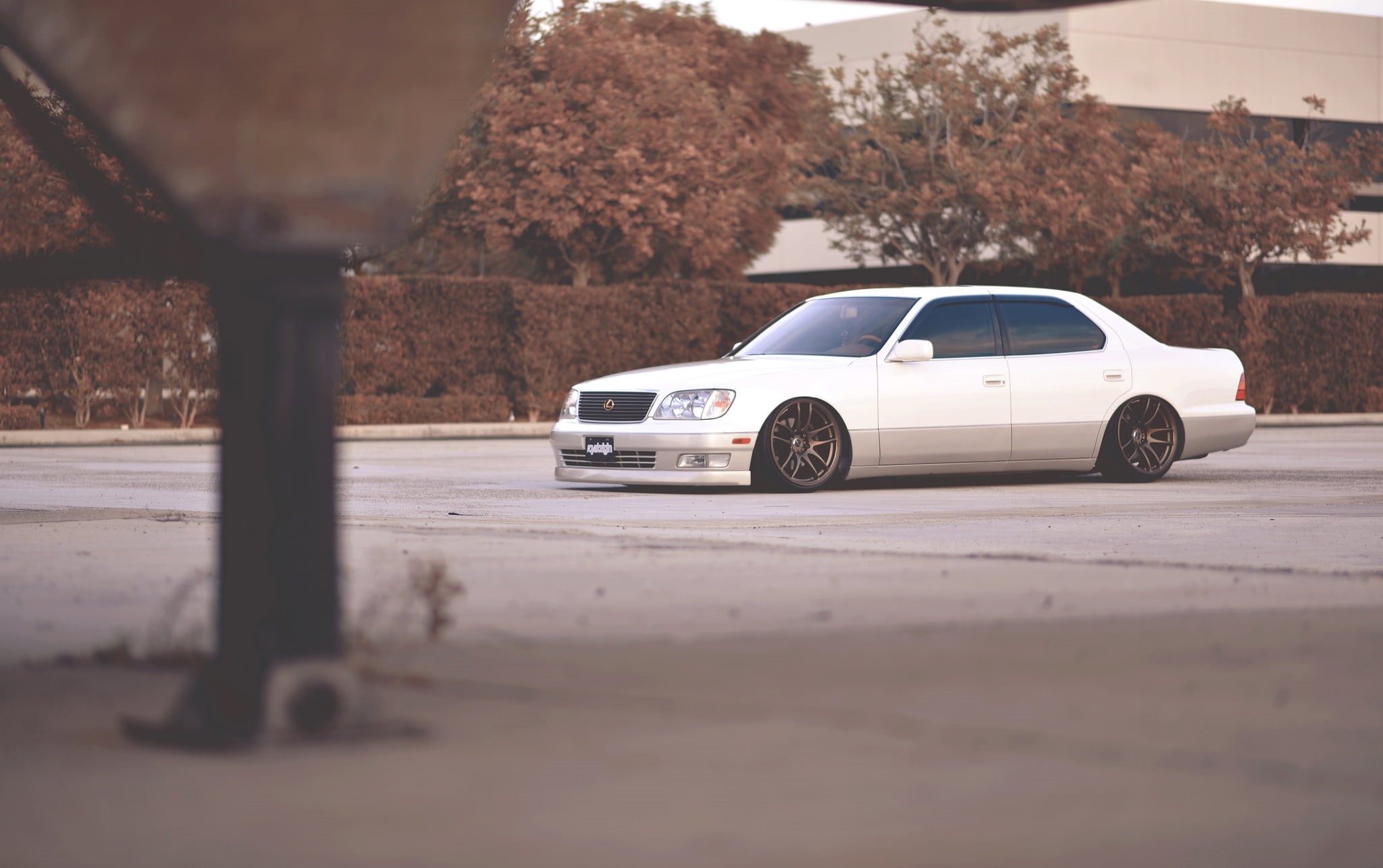 focus on background, Lexus, selective focus, modern, motor vehicle, sedan, no People, architecture, city, editorial, road, tree, plant, land Vehicle, outdoors, HD Wallpaper