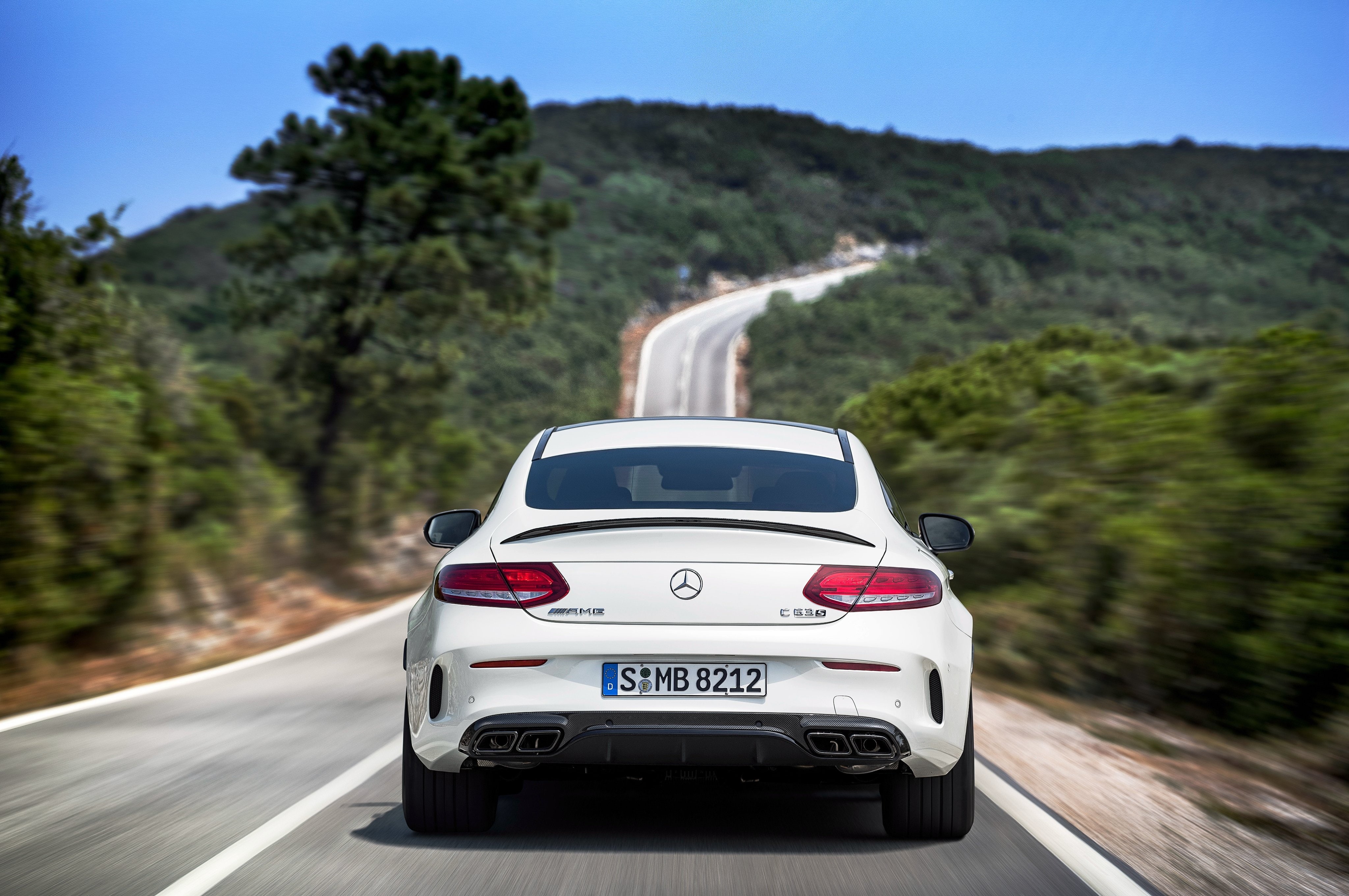 Vehicle, road, mountain, outdoors, 4K, mode of transportation, on the move, motor vehicle, sky, mercedes amg c63 s coupe, day, car, motion, plant, land vehicle, HD Wallpaper