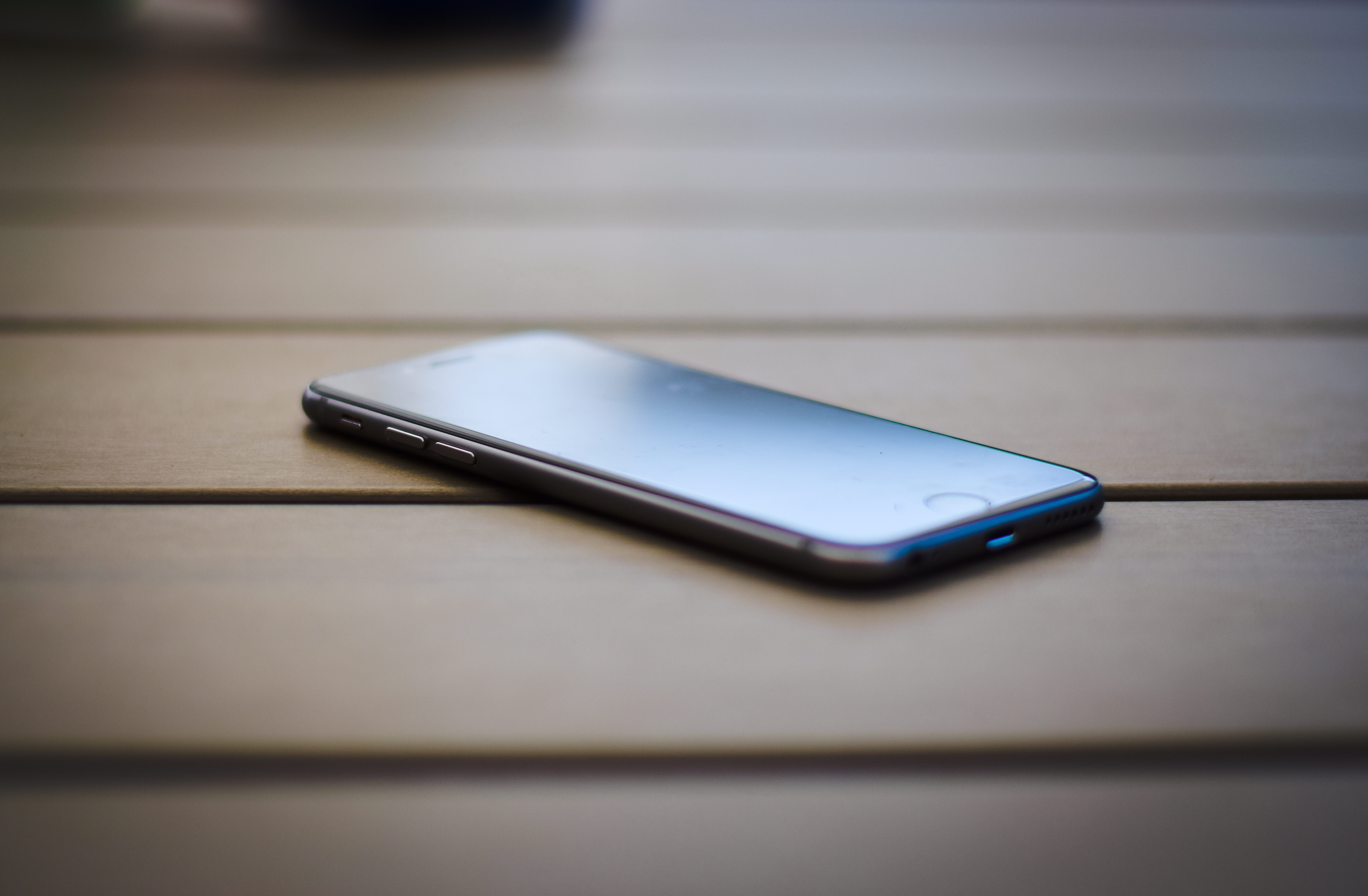 portable information device, product, flat, brown, reflect, clean, mobile, selective focus, close-up, phone, sideview, modern, single object, technology, HD Wallpaper