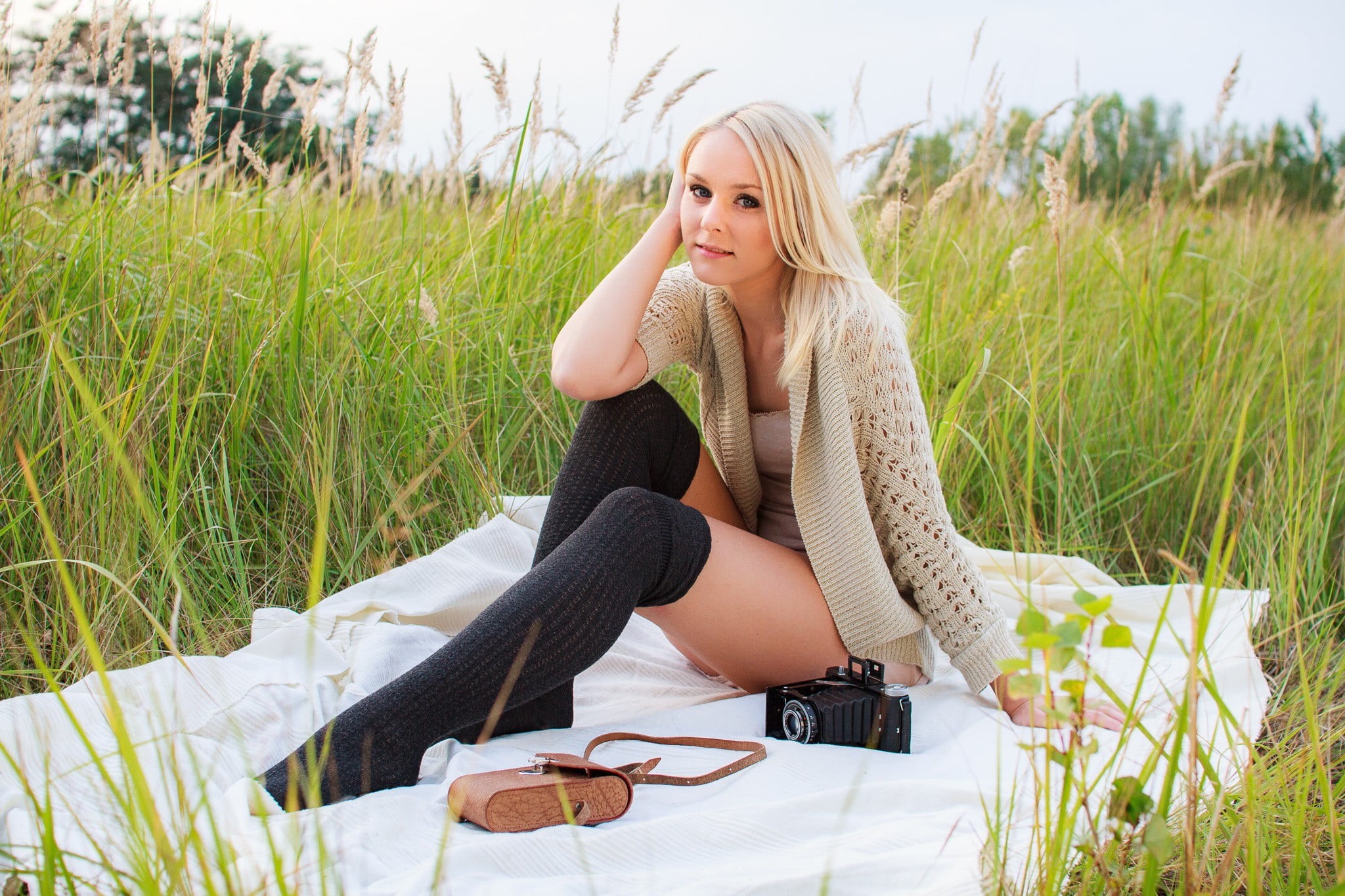 plant, nature, beauty, stockings, fashion, lifestyles, sitting, knitted, outdoors, blonde, young women, grass, 1080P, legs, looking at viewer, adult, long hair, HD Wallpaper