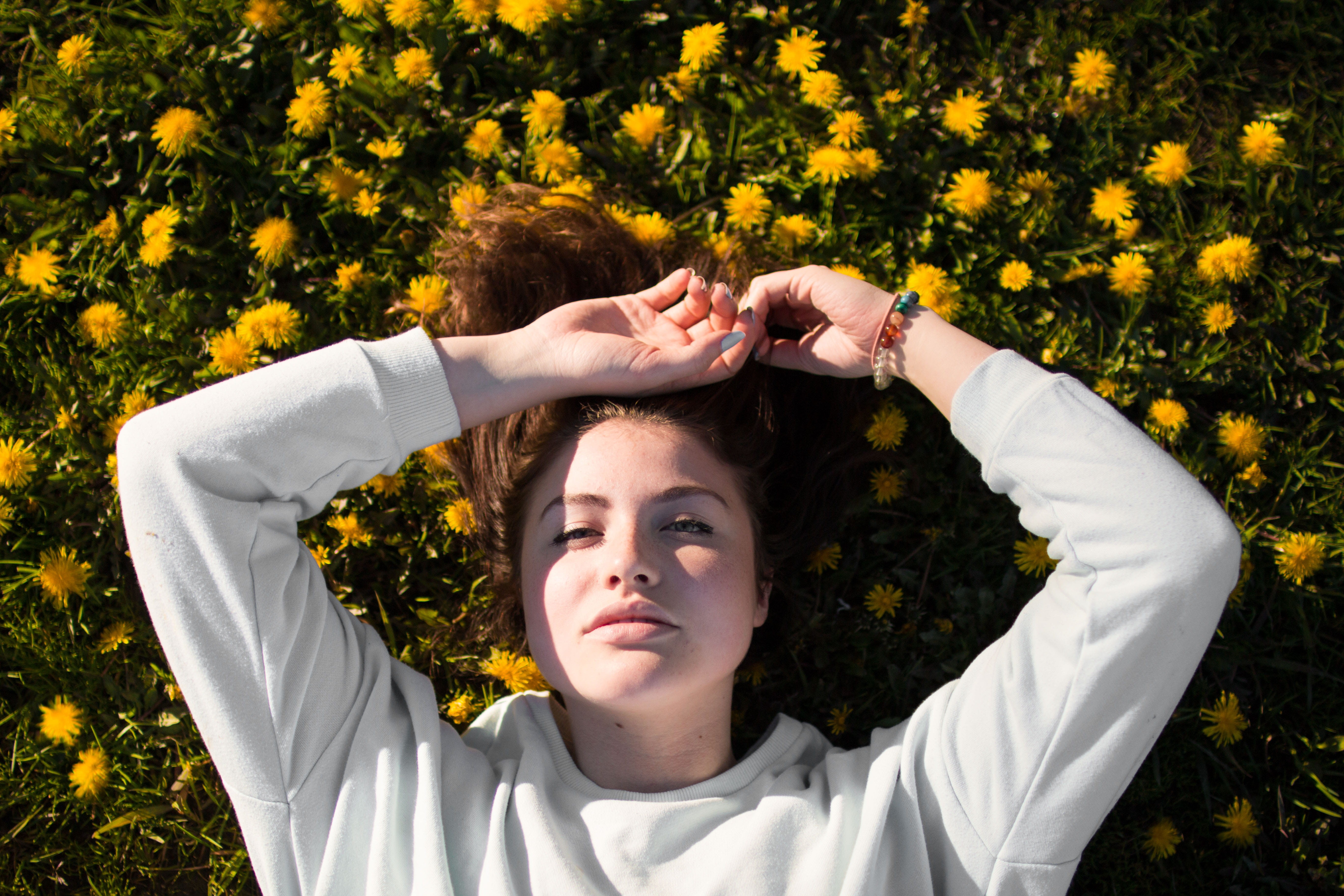 petal, yellow, serene People, park - Man Made Space, laying, white, young women, shirt, wearing, lying, brown Hair, day, males, arms raised, lying Down, HD Wallpaper