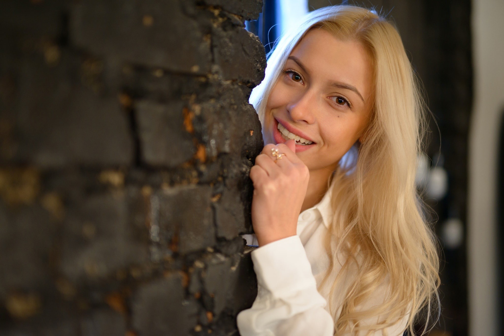 bricks, smiling, face, wall, blonde, women, model, portrait, long hair, Anton Pechkurov, 1080P, Olga Kuzmenkova, HD Wallpaper