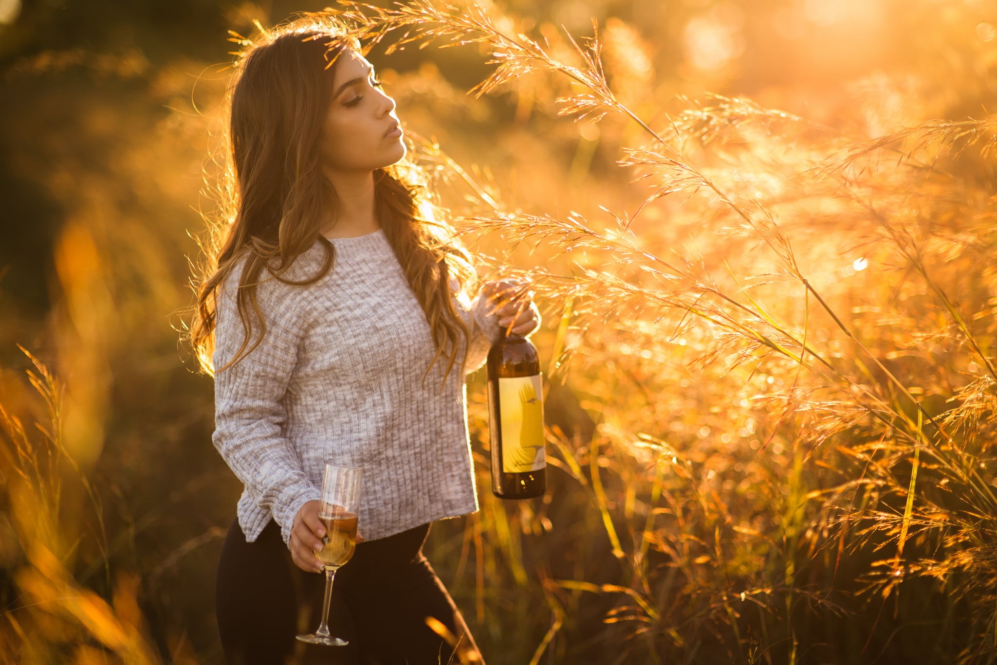 drinking glass, beautiful woman, sunlight, standing, Christopher Rankin, nature, women outdoors, outdoors, one person, young women, sunset, bottles, casual clothing, HD Wallpaper