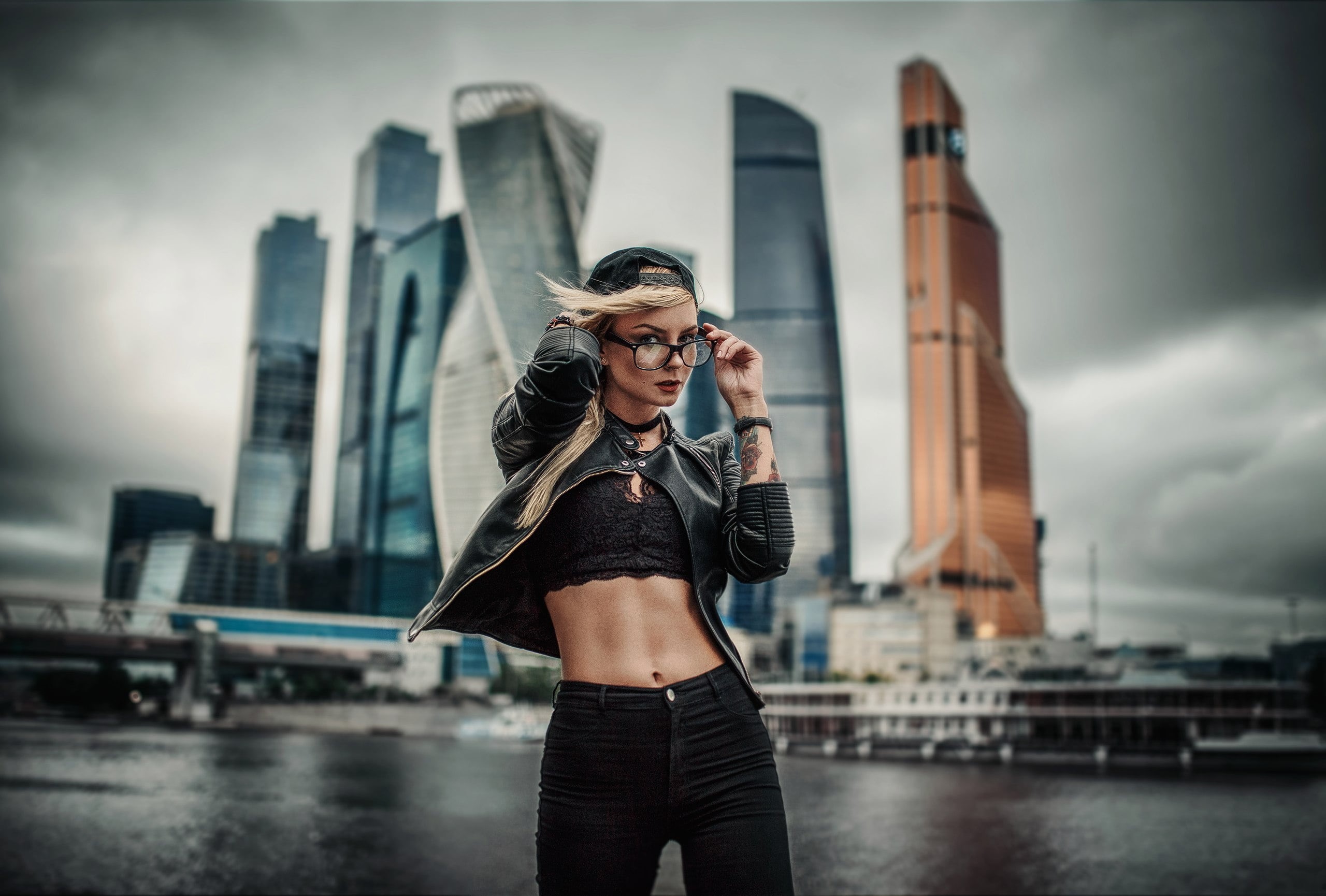 belly, urban, beautiful woman, 2K, focus on foreground, leather jackets, portrait, clothing, young women, hairstyle, architecture, model, black tops, one person, HD Wallpaper