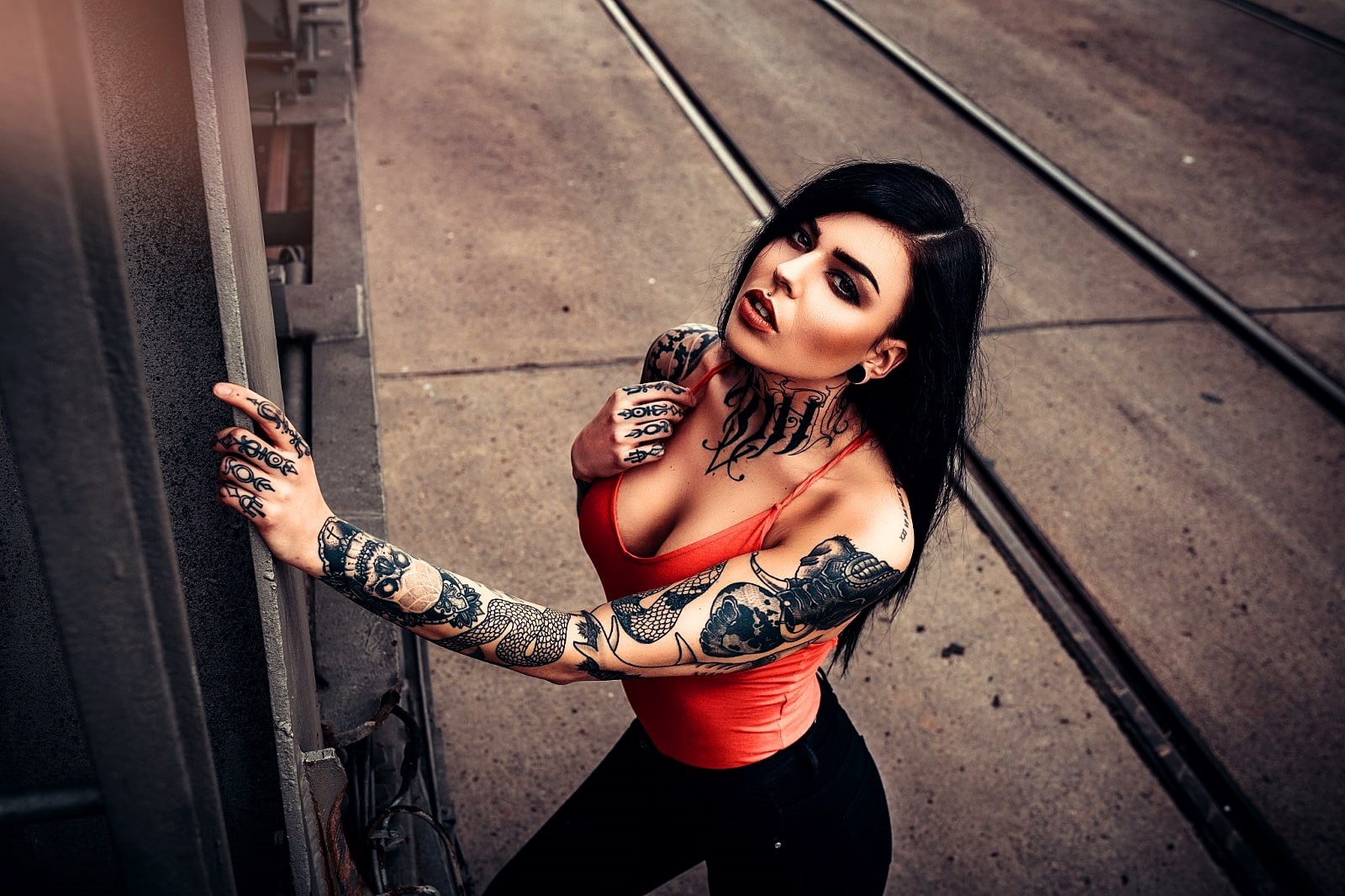 architecture, 720P, young women, piercing, fashion, red shirt, leisure activity, jeans, one person, tattoo, lipstick, black eyes, red lipstick, clothing, HD Wallpaper