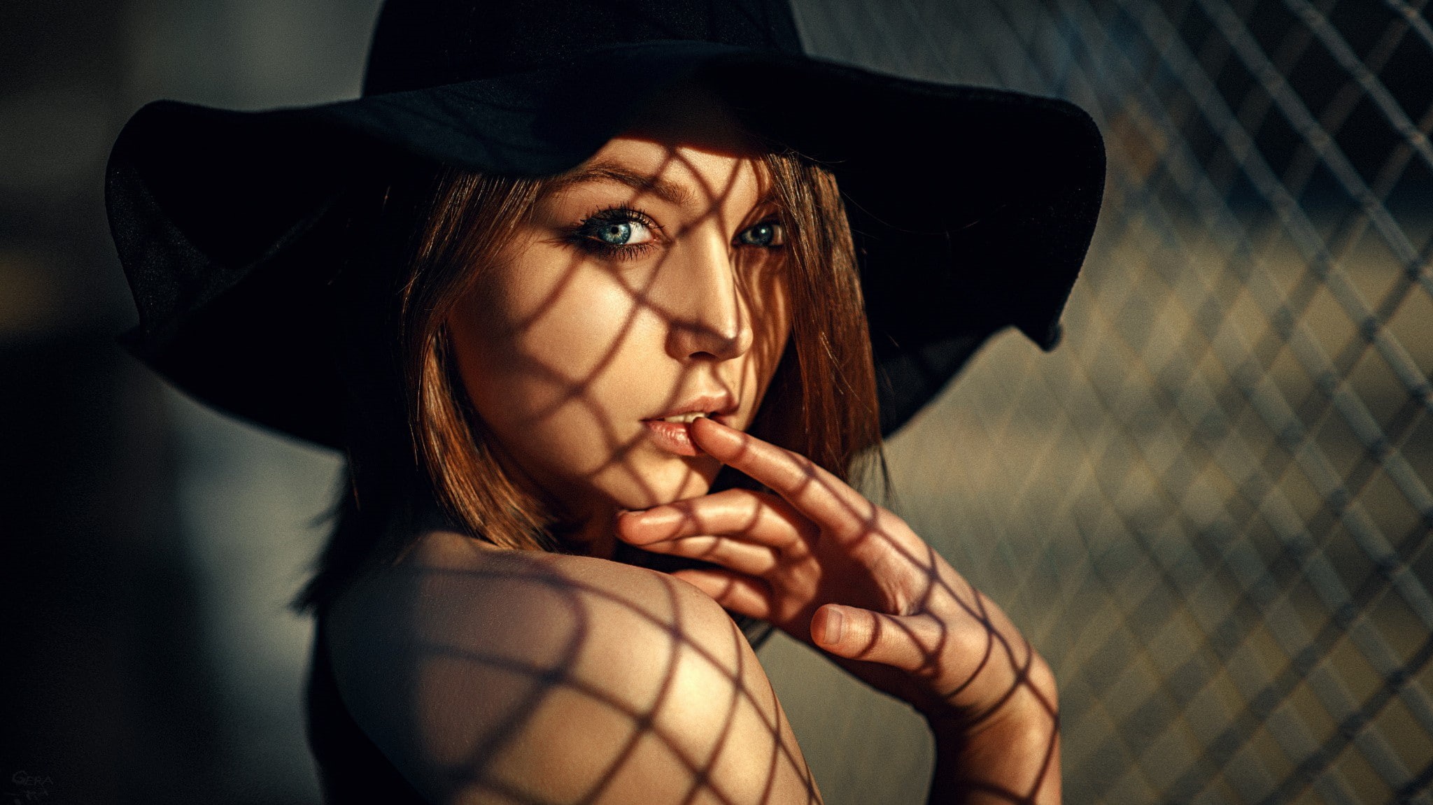 bare shoulders, fence, Georgy Chernyadyev, hat, women, face, 1080P, Olya Pushkina, finger in mouth, portrait, blue eyes, model, brunette, shadow, HD Wallpaper