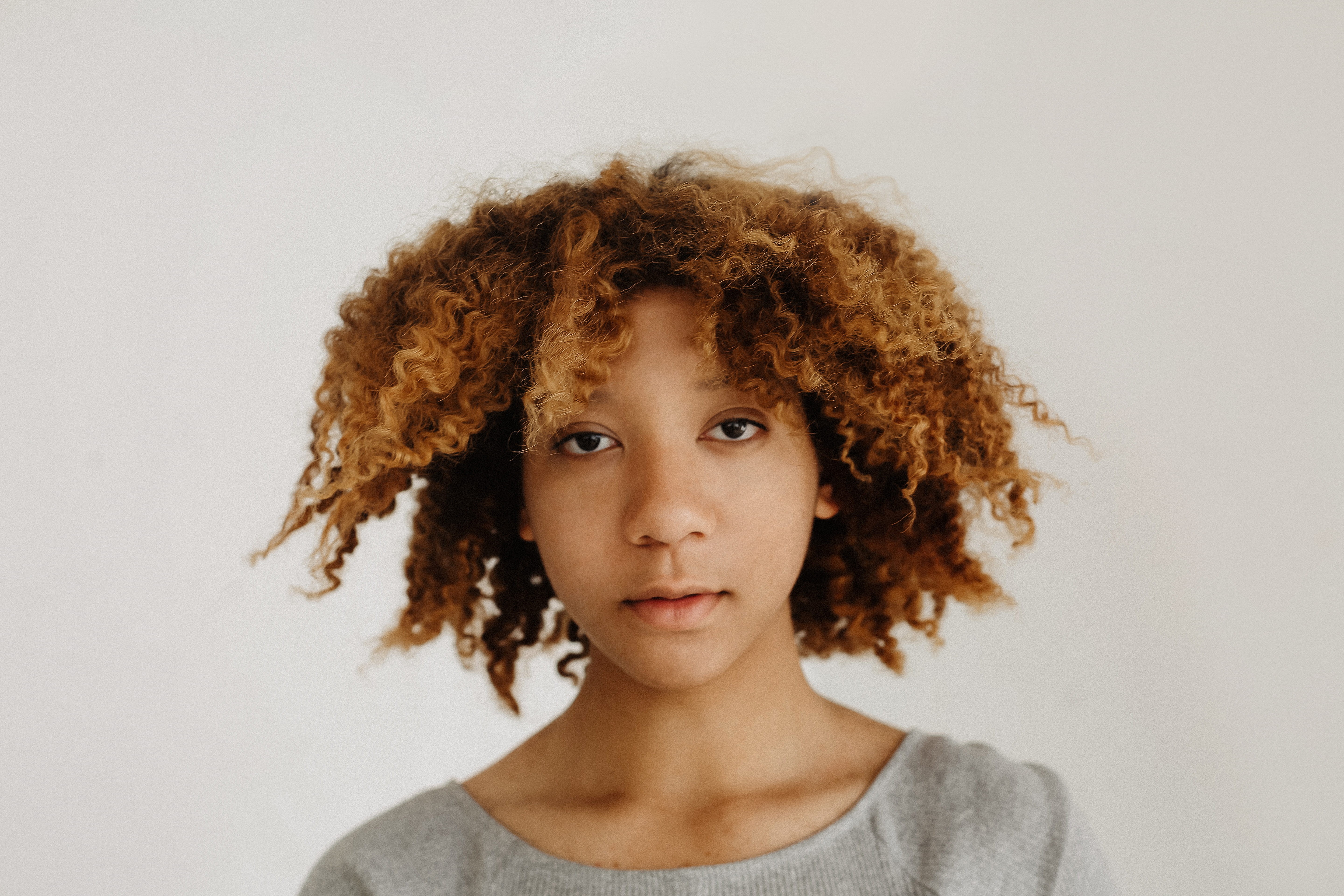 cute, brown hair, pretty, smiling, looking at camera, hairdo, curly hair, studio shot, casual clothing, child, indoors, human hair, beauty, afro, hairstyle, HD Wallpaper