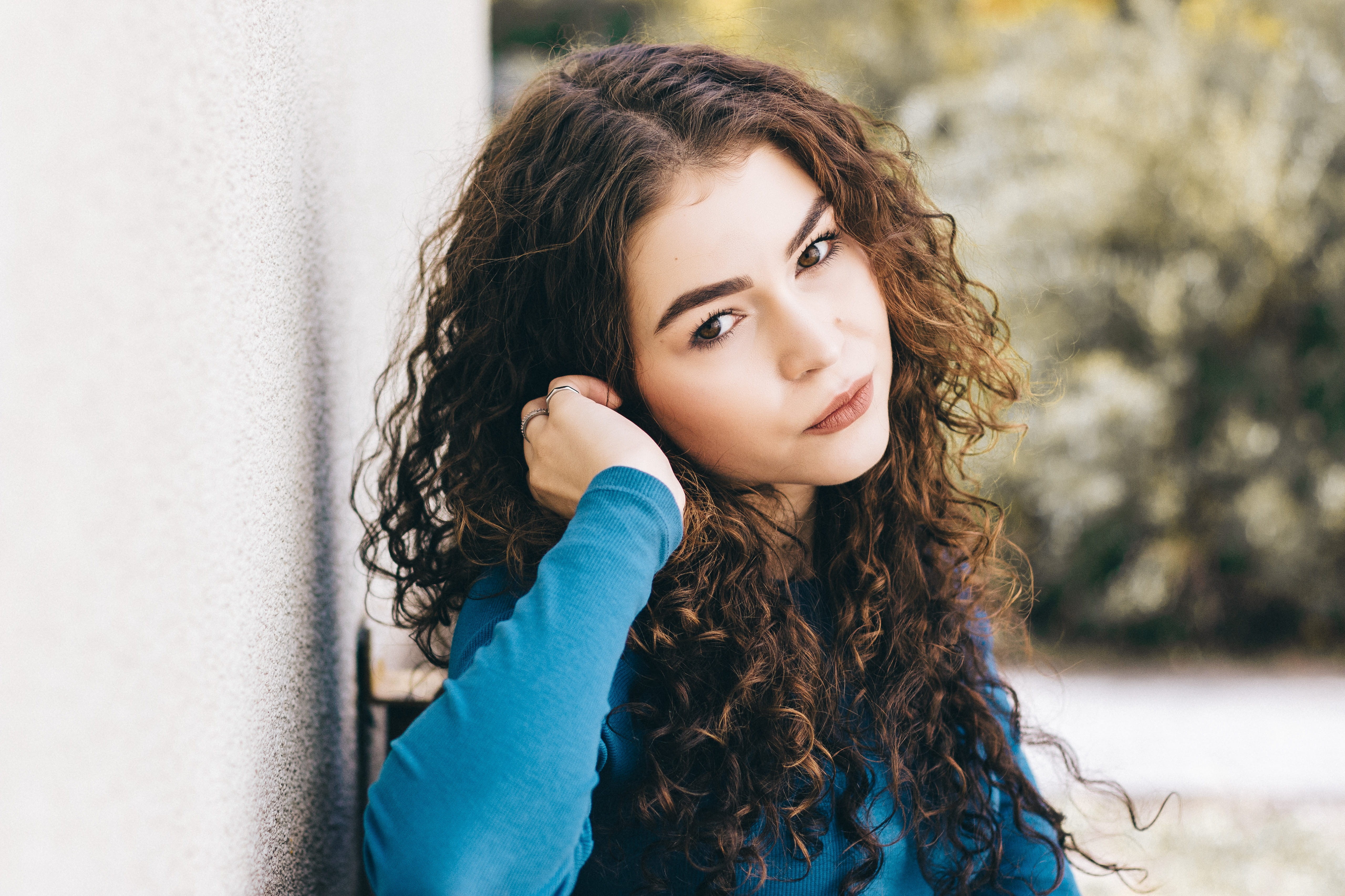 teenager, portrait, hairstyle, young women, leisure activity, beauty, 5K, cute, looking at camera, blue, wall - building feature, lifestyles, pretty, curly hair, HD Wallpaper