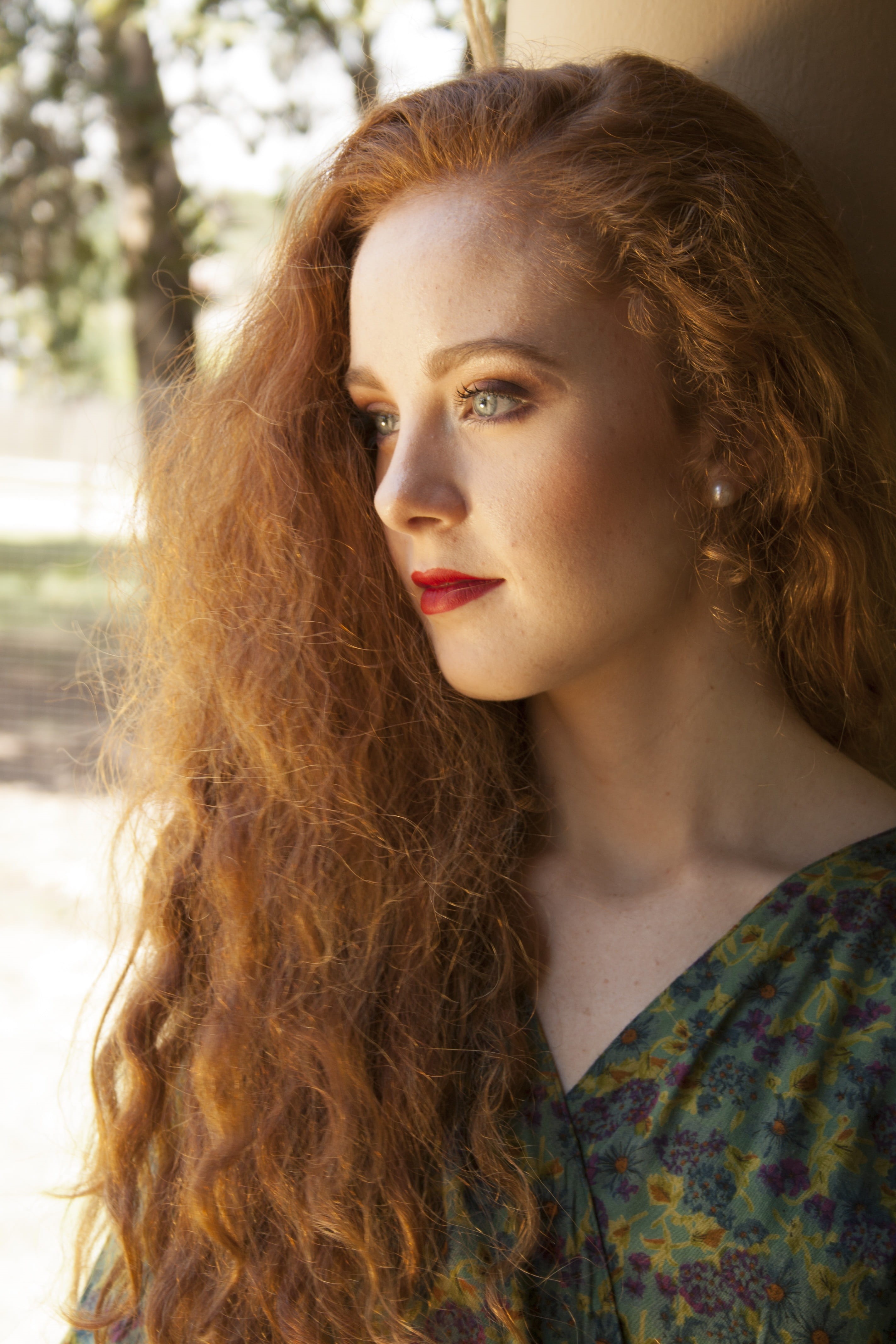 front view, red hair, frizzy, floral, focus, brunette, adult, looking at camera, women, brown hair, 4K, redhead, beauty, long hair, contemplation, curly hair, Phone HD Wallpaper