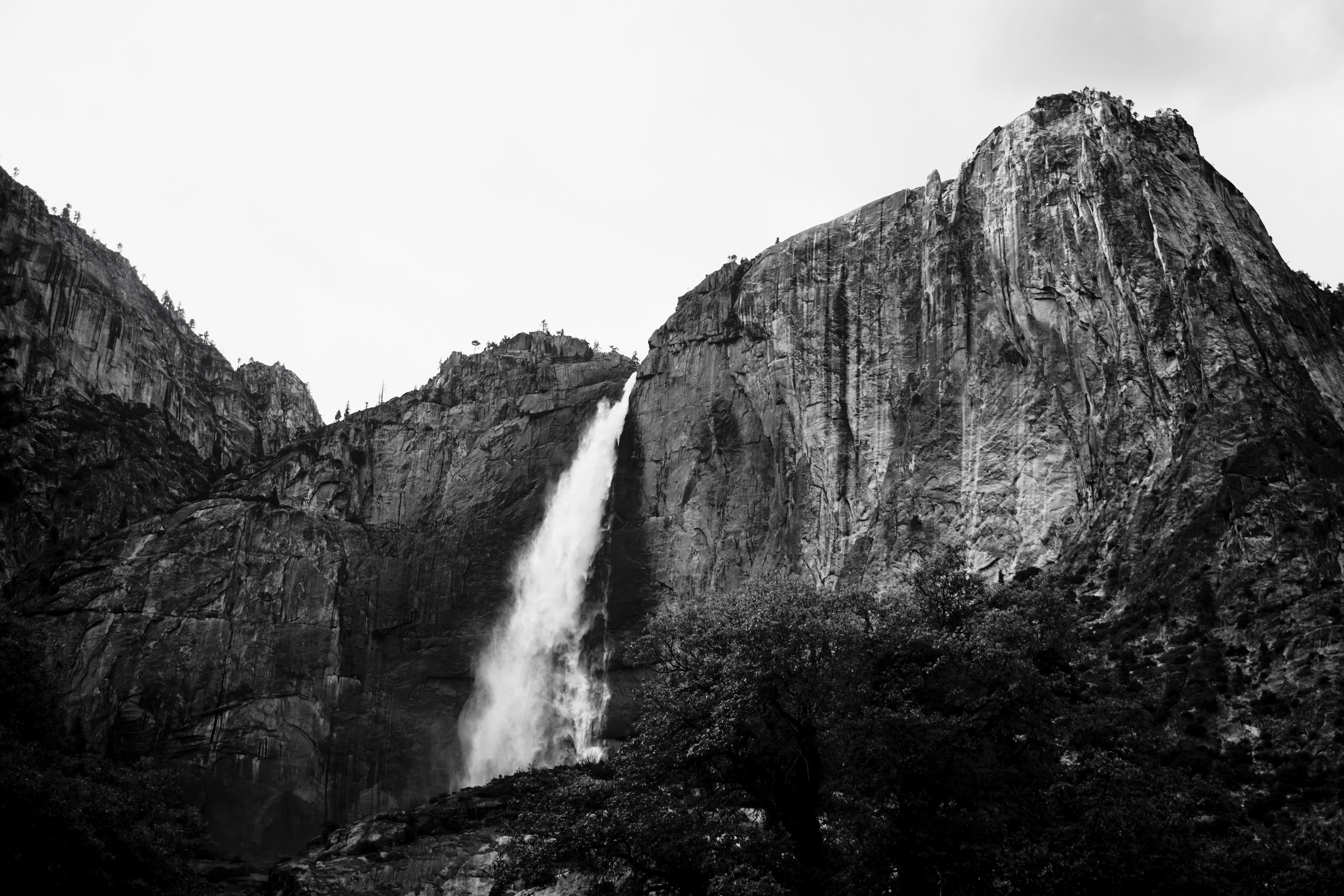 grayscale, water, motion, waterfall, land, mountain range, rock formation, daytime, no people, outdoors, power in nature, black and white, flowing water, HD Wallpaper