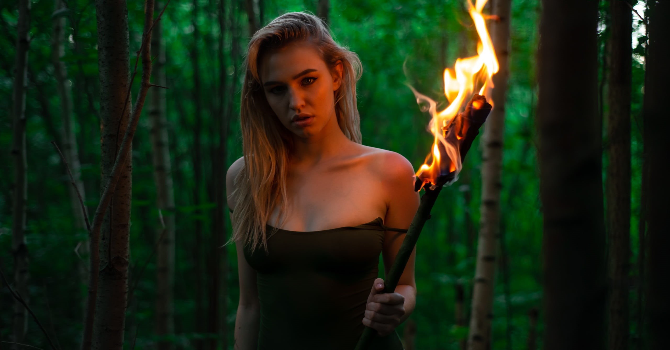 forest, bare shoulders, contemplation, portrait, strapless, burning, blonde, beautiful woman, nature, 2K, hairstyle, women, holding, beauty, s, torches, HD Wallpaper