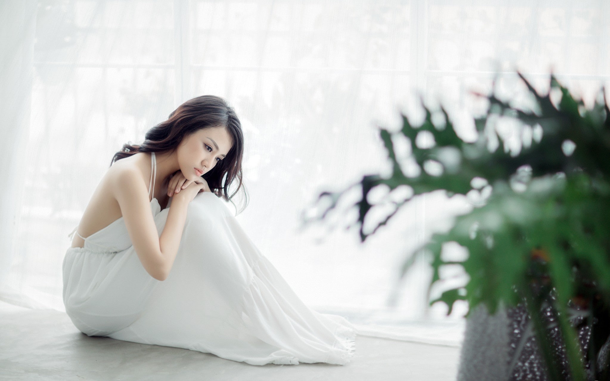 model, halter top, on the floor, black hair, white dress, Asian, sitting, plants, brunette, 1080P, women, HD Wallpaper