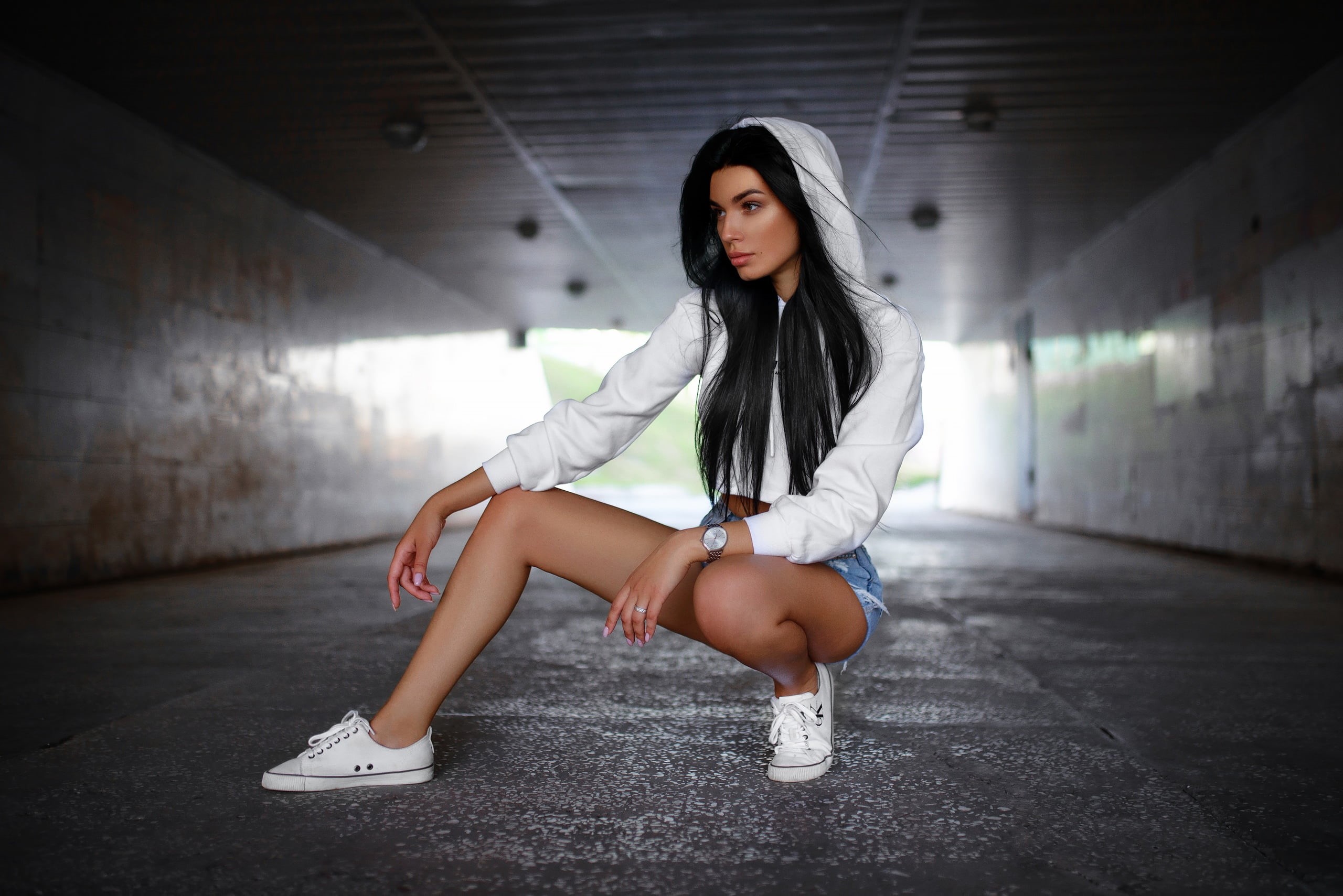 looking away, sneakers, 2K, watch, sweater, jean shorts, squatting, hoods, brunette, pink nails, Calvin Klein, women, black hair, straight hair, HD Wallpaper