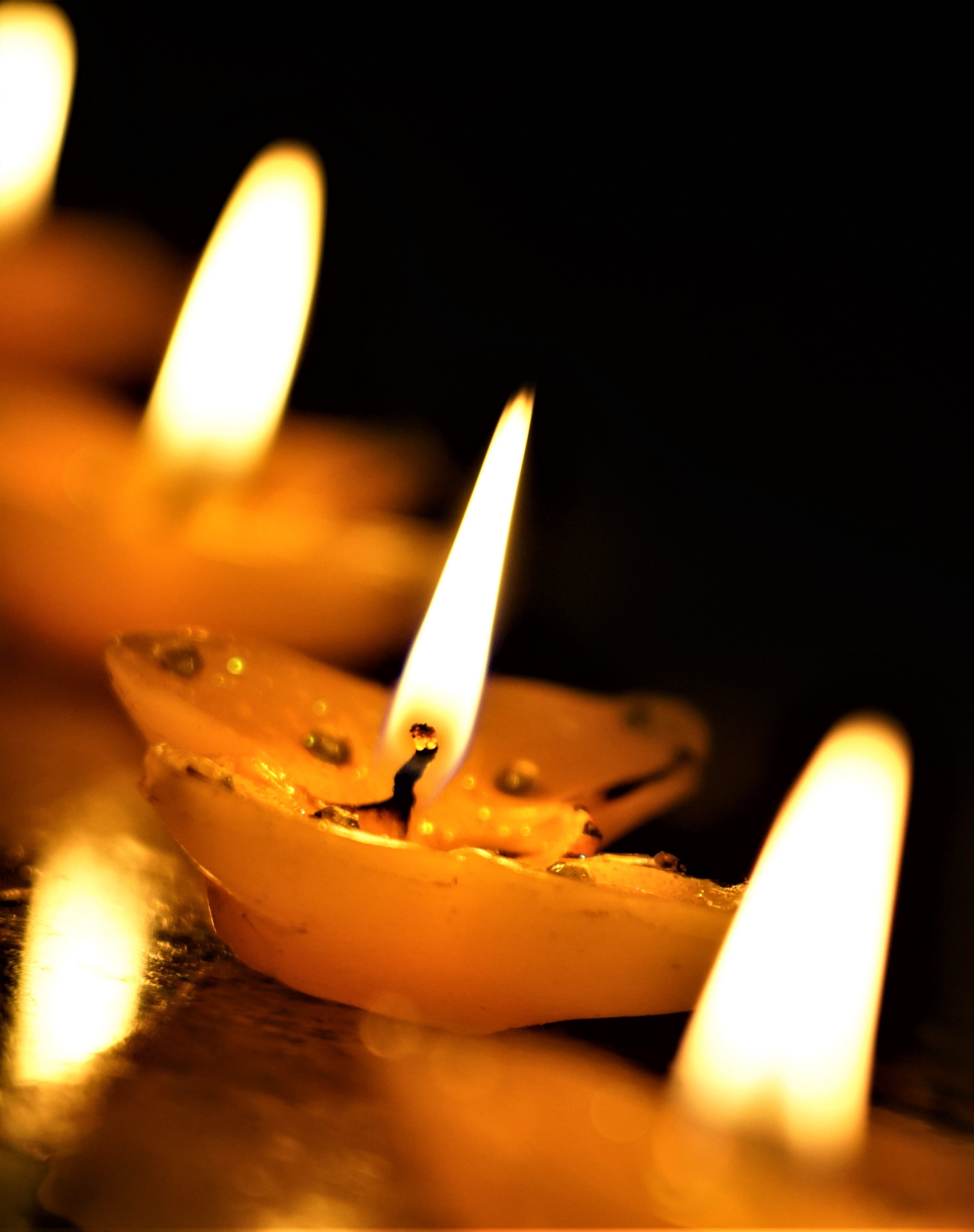 heat - temperature, burning, glowing, diwali, festival, focus on foreground, indoors, greeting, culture, celebration, dark, no people, flame, prayer, fire, Phone HD Wallpaper