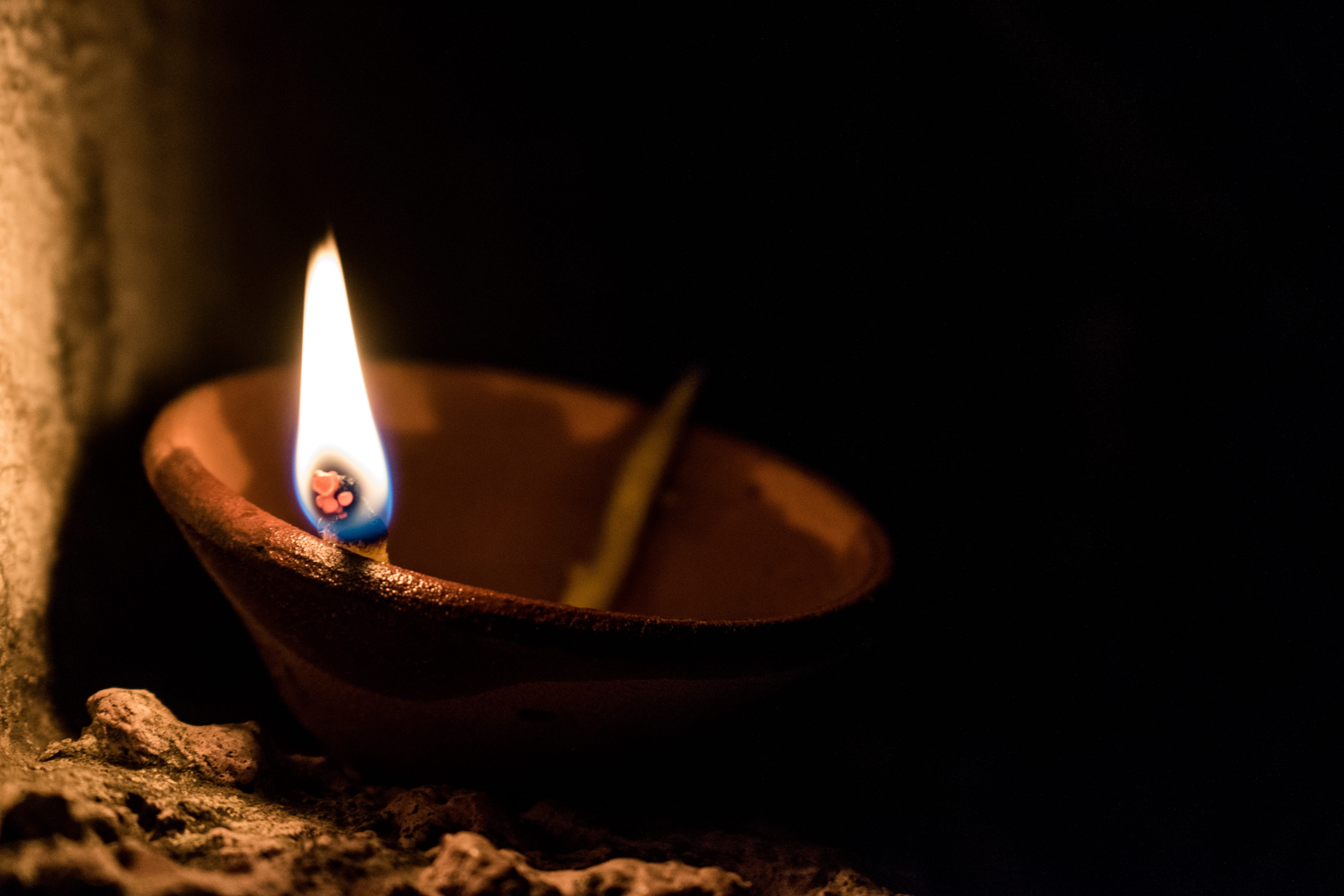 selective focus, celebration, ray, hope, fire - natural phenomenon, black background, electric lamp, festival, close-up, no people, indoors, flame, fire, HD Wallpaper