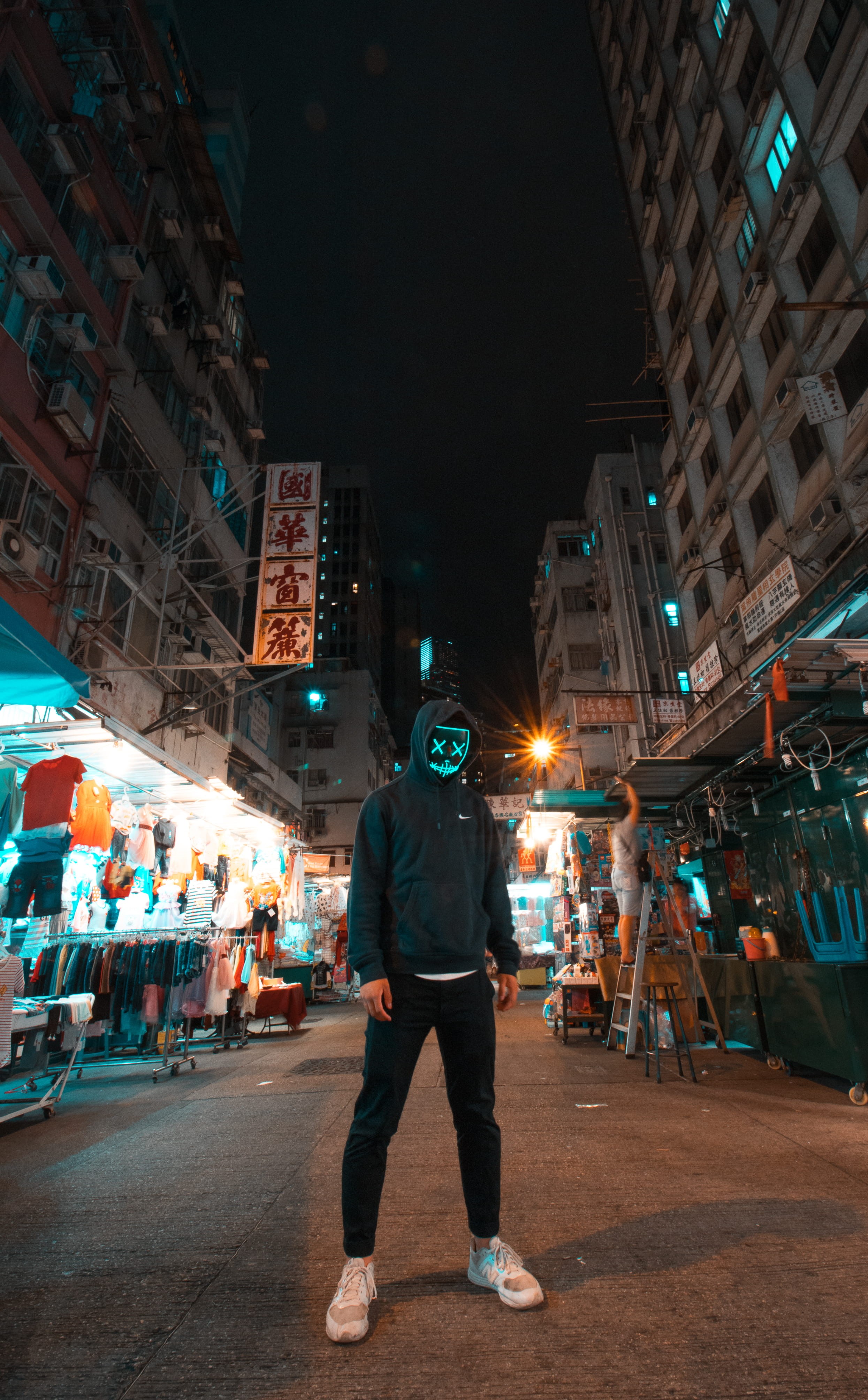 sweatshirt, nike, person, editorial, mask, hongkong, city Life, 4K, urban, hoodie, black, people, new balance, street, night, standing, dark, men, building, Phone HD Wallpaper