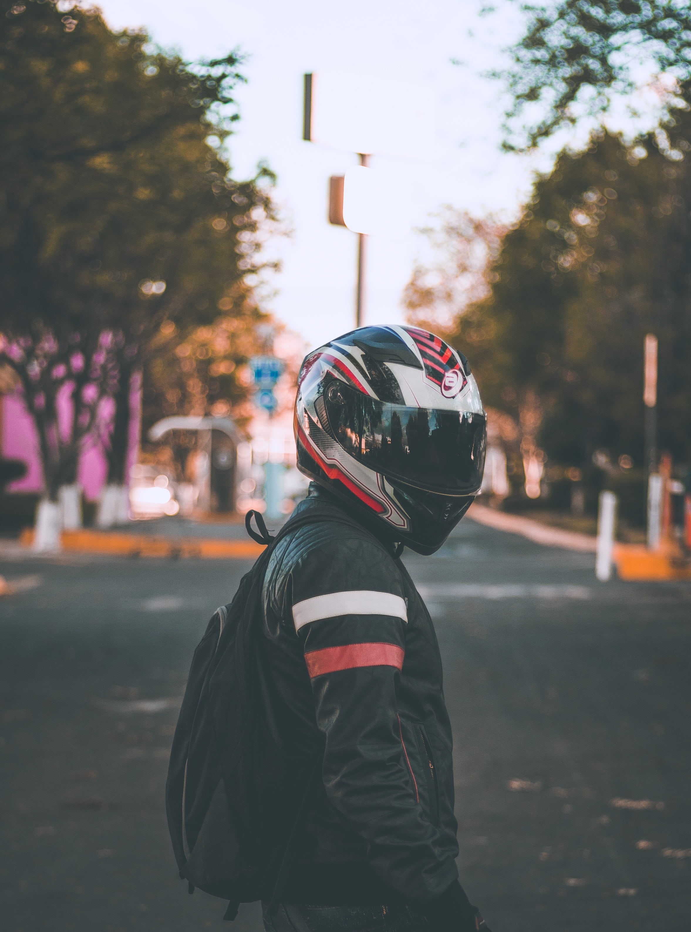 plant, child, face, street, city, outdoors, blur, full, men, motorcyclist, headwear, childhood, day, red, focus on foreground, nature, side view, standing, Phone HD Wallpaper