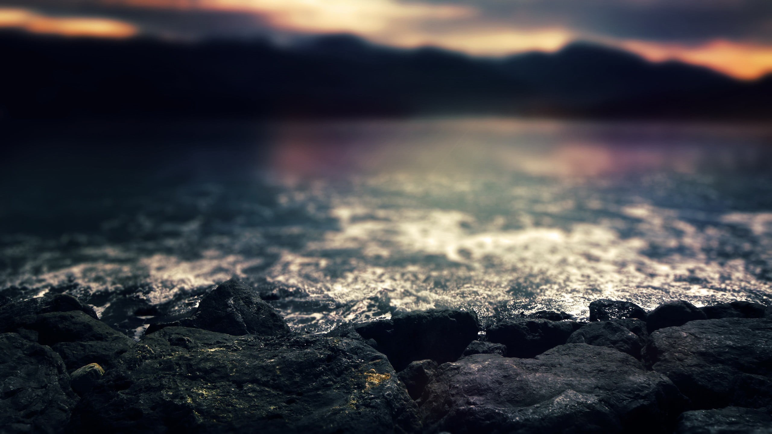 mountain, blue, mountains, coast, heat - temperature, summer, focus on foreground, tranquil Scene, selective focus, stone - Object, land, black, lake, coastline, HD Wallpaper