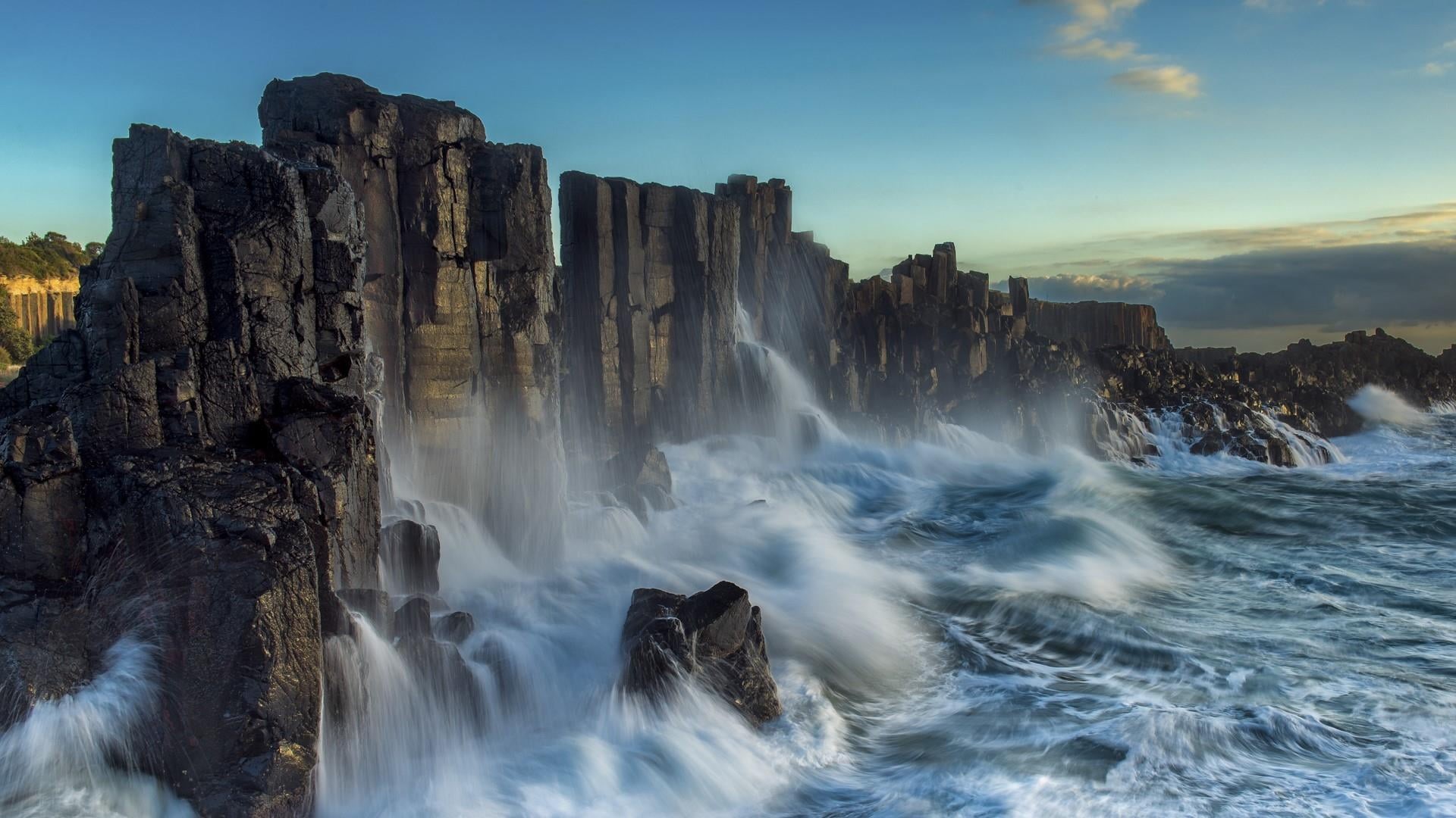 rocks, rock - object, escarpment, non-urban scene, waterfront, sky, body of water, waterfall, flowing, day, kiama, outdoors, flowing water, power in nature, HD Wallpaper