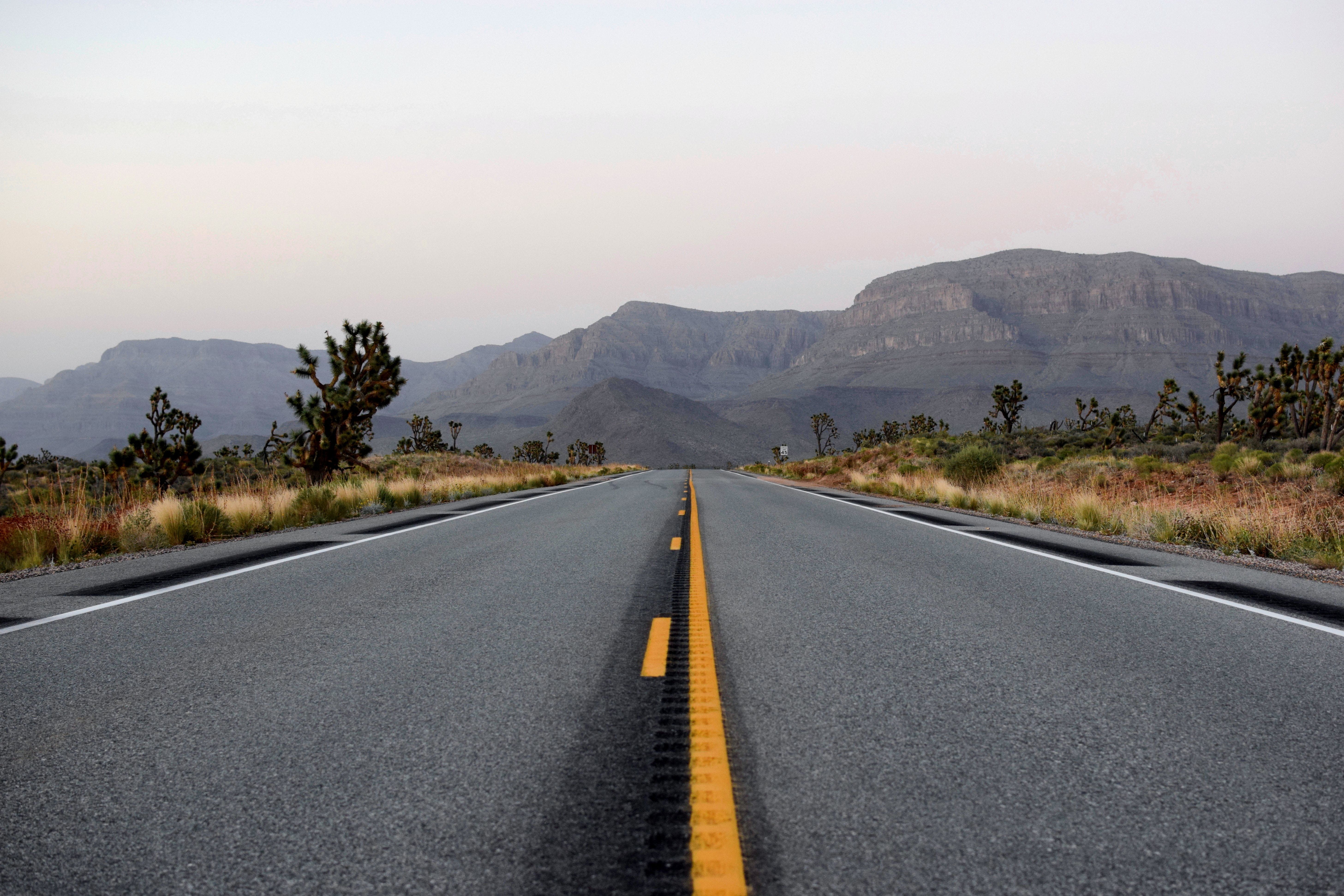 arid climate, sky, mountain range, 5K, asphalt, dividing Line, the way forward, beauty in nature, scenics - nature, double yellow line, field, landscape, HD Wallpaper