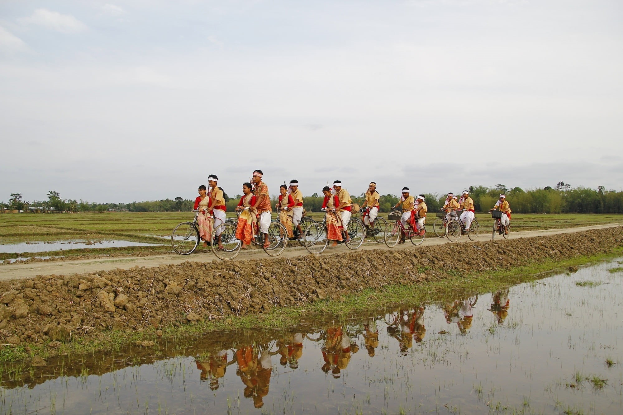 bihu, wheel, assam, water, nature, women, spoke, body, day, real people, sky, outdoor, exercise, bike, sport, pedal, cyclist, group, 1080P, cycling, road, HD Wallpaper