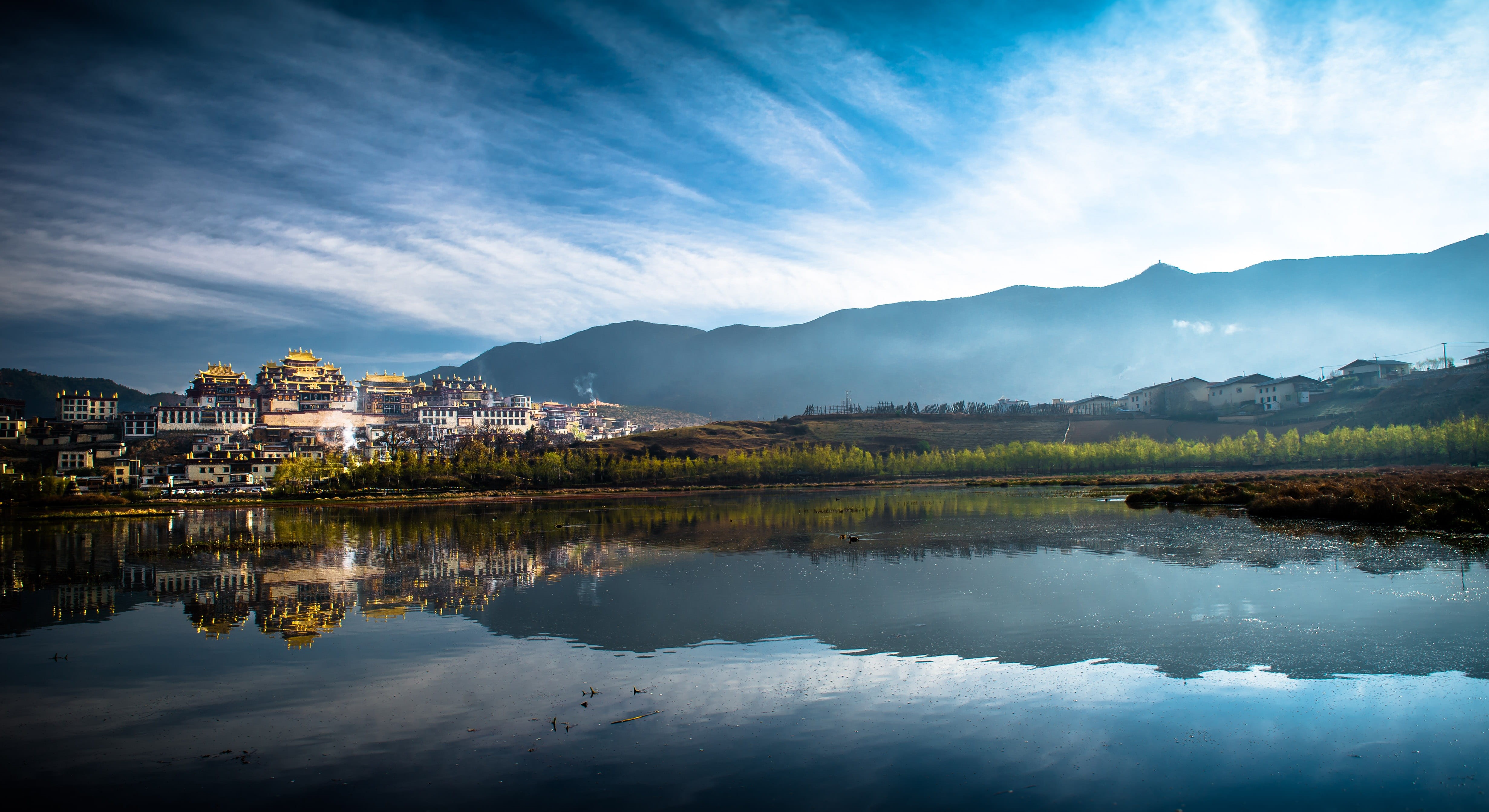 outdoors, blue, water, Tibetan Culture, 4K, city, mountain, summer, built structure, tree, landscape, nature, panoramic, house, building exterior, no people, HD Wallpaper