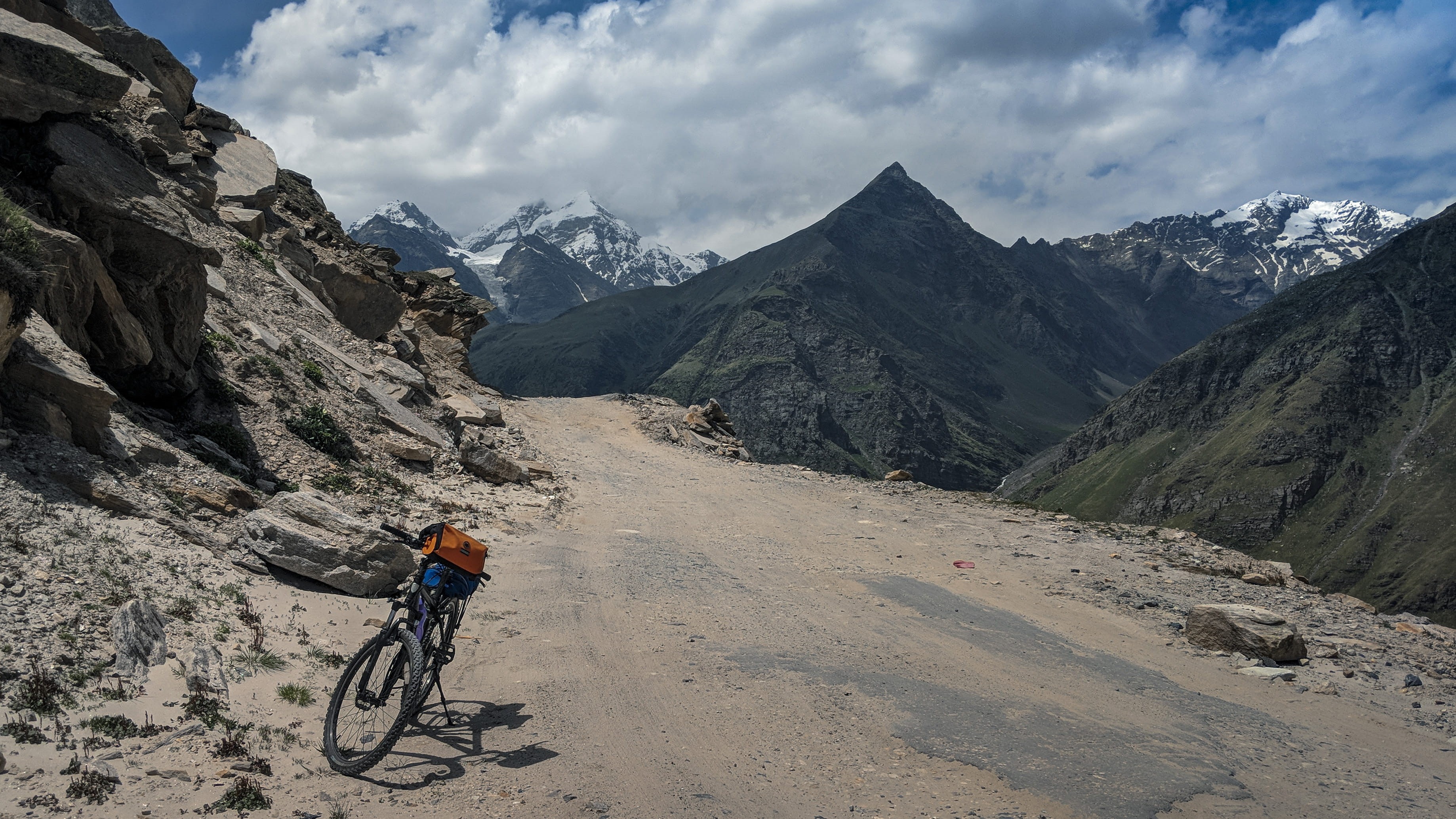 transportation, mountains, india, road, leisure activity, lifestyles, mountain road, cloud - sky, one person, adventure, mountain bike, mode of transportation, HD Wallpaper