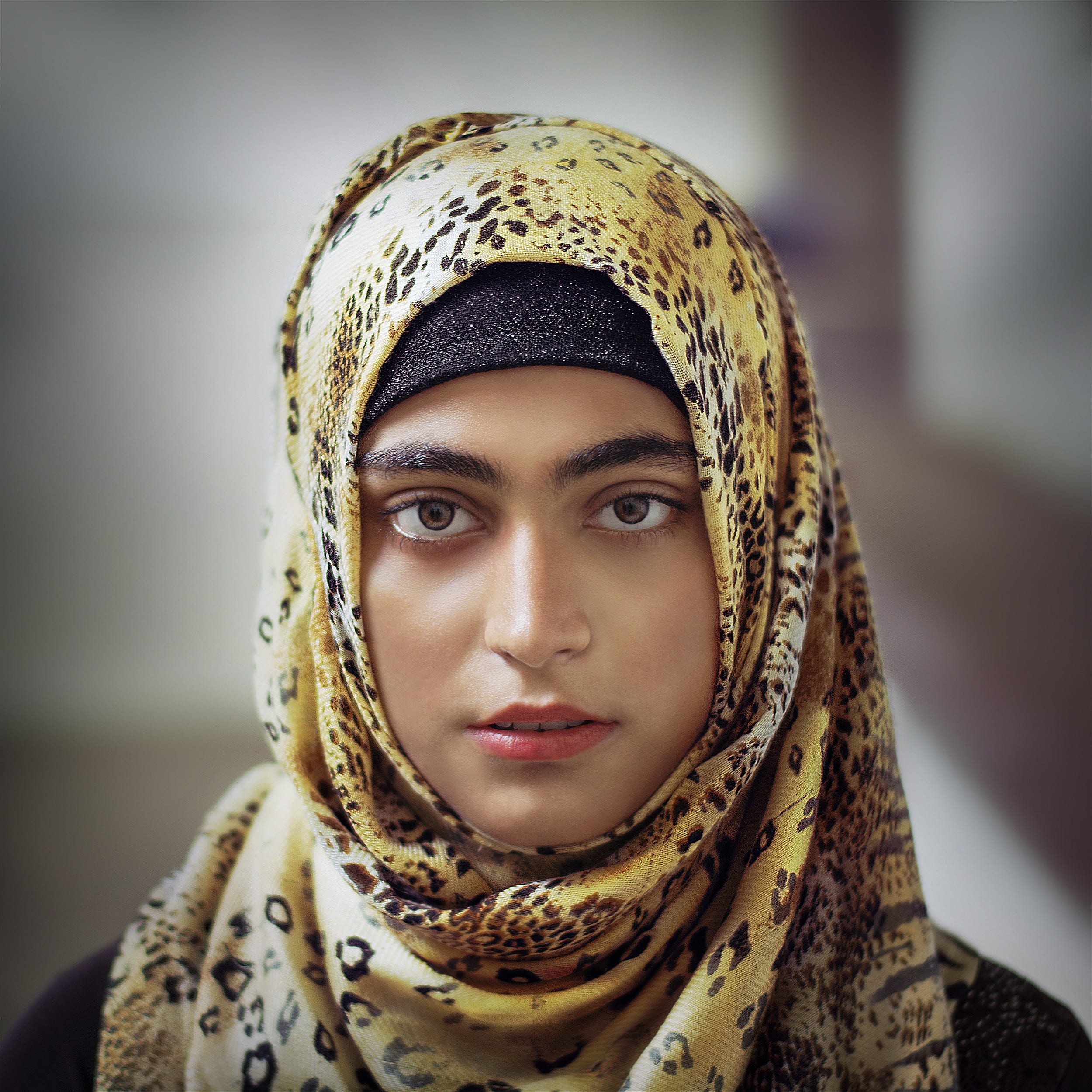 human face, focus on foreground, headscarf, beautiful woman, noor, yellow, serious, looking at camera, woman, wearing, beauty, 1080P, scarf, real people, Phone HD Wallpaper