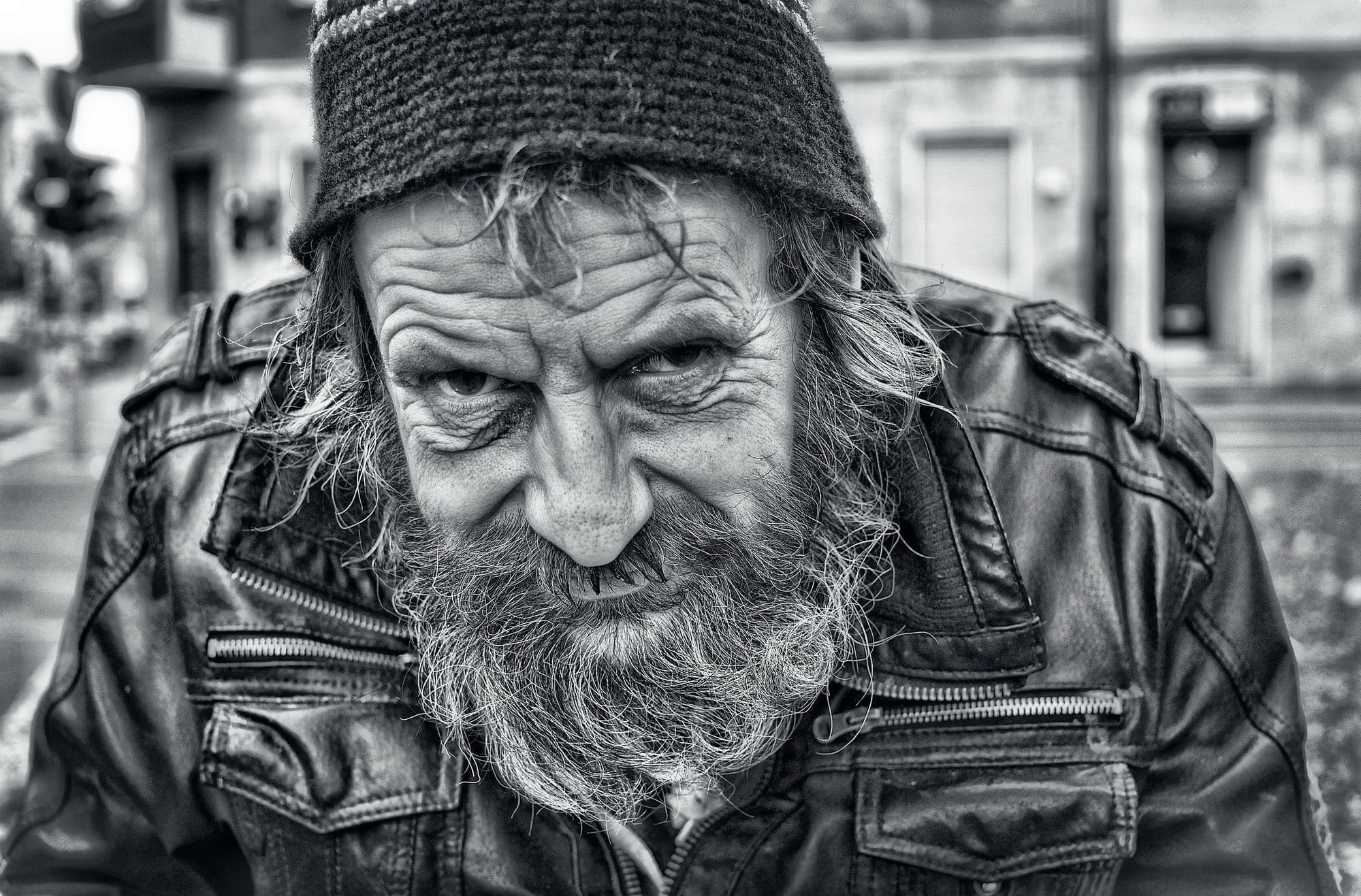 facial hair, focus on foreground, one person, wrinkled face, zip, 1080P, jacket, real people, outdoors, headshot, old people, leather, males, social issues, HD Wallpaper