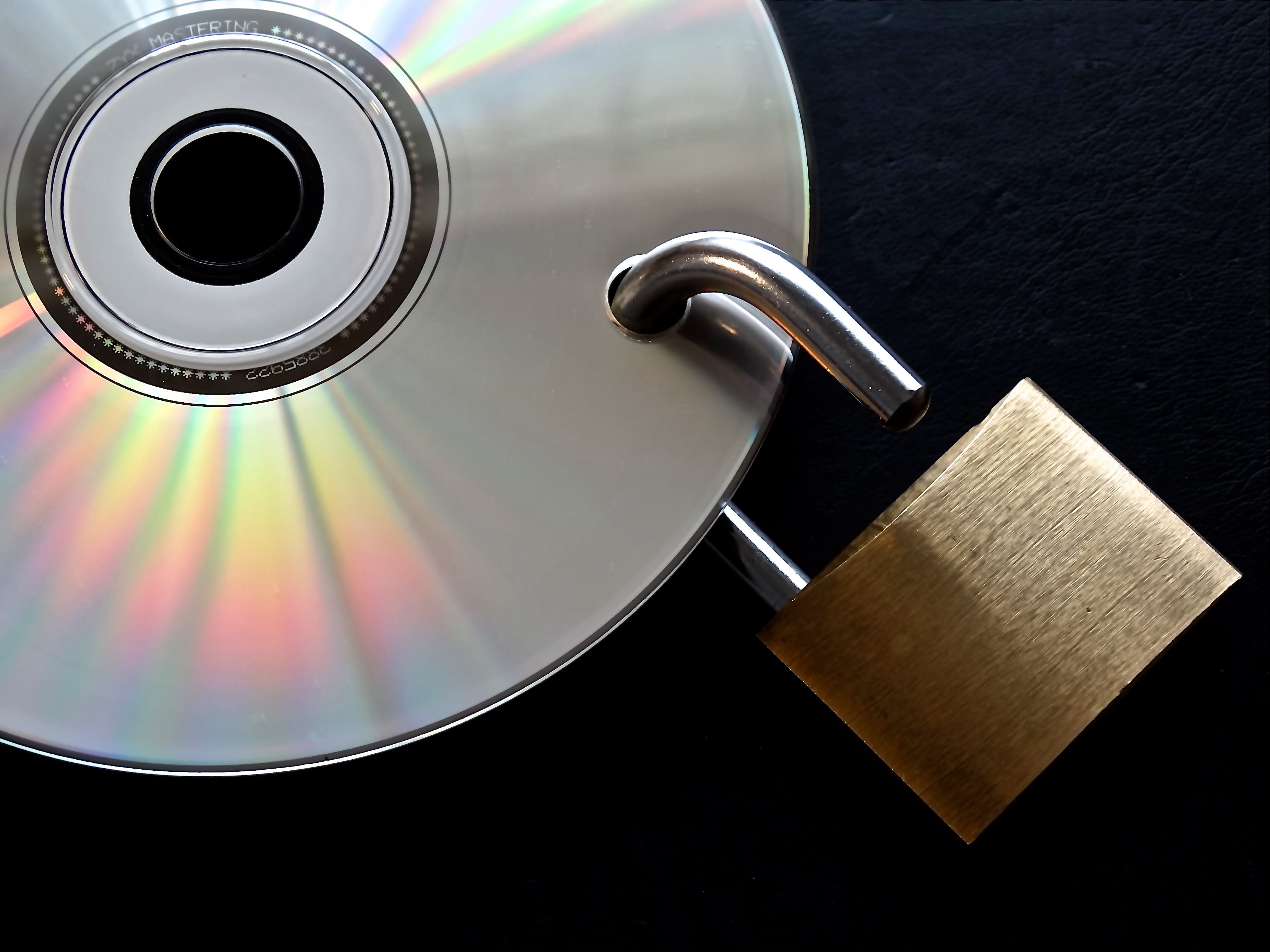 high angle view, data slice, data backup, black background, golden, disc, coffee, studio shot, uncertain, table, Privacy Policy, digital, Encrypted, u-lock, HD Wallpaper