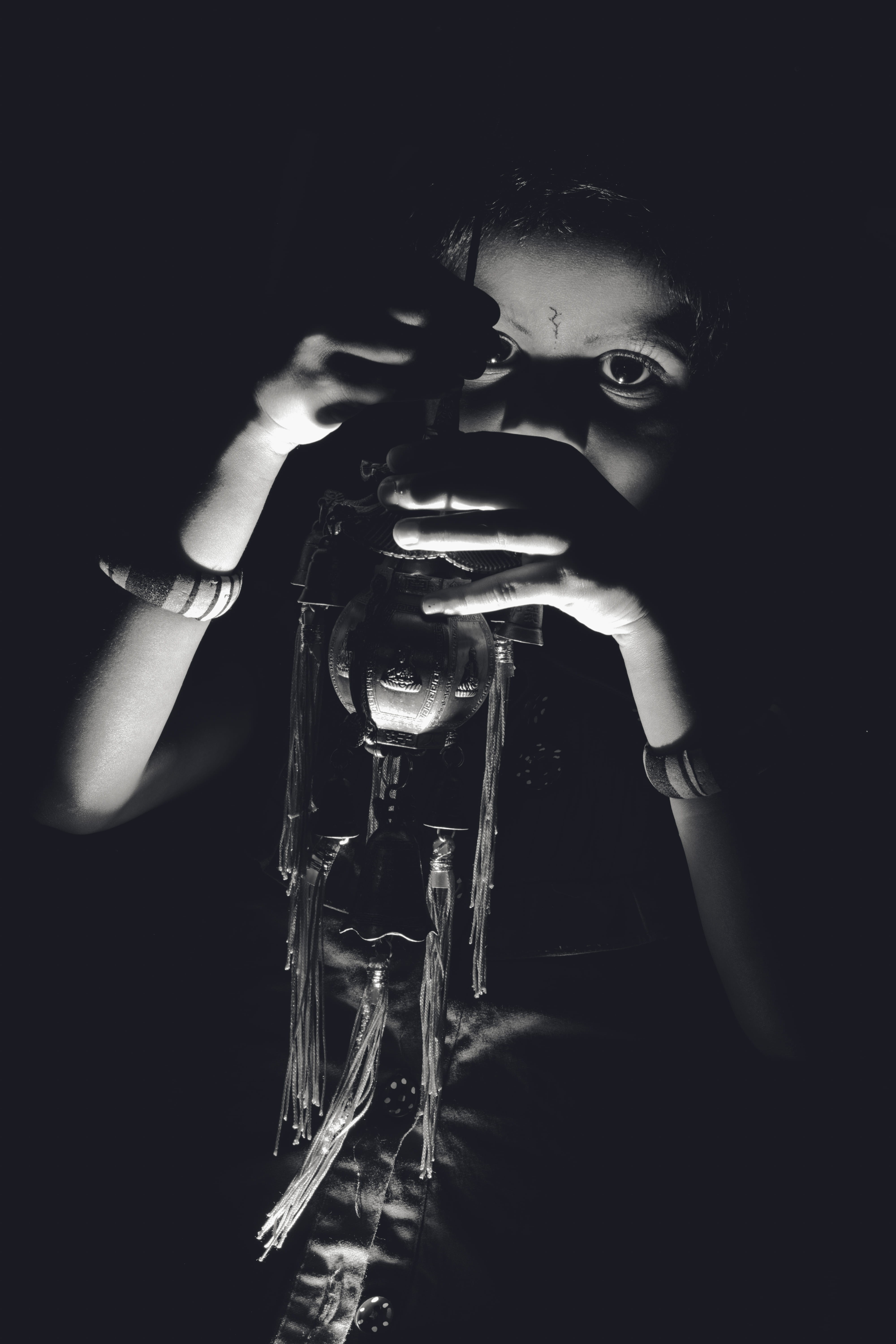 child, indoors, one person, 5K, indian girl, darkroom, headshot, low key, domestic room, balck and white, lifestyles, black background, males, girl, looking at camera, Phone HD Wallpaper