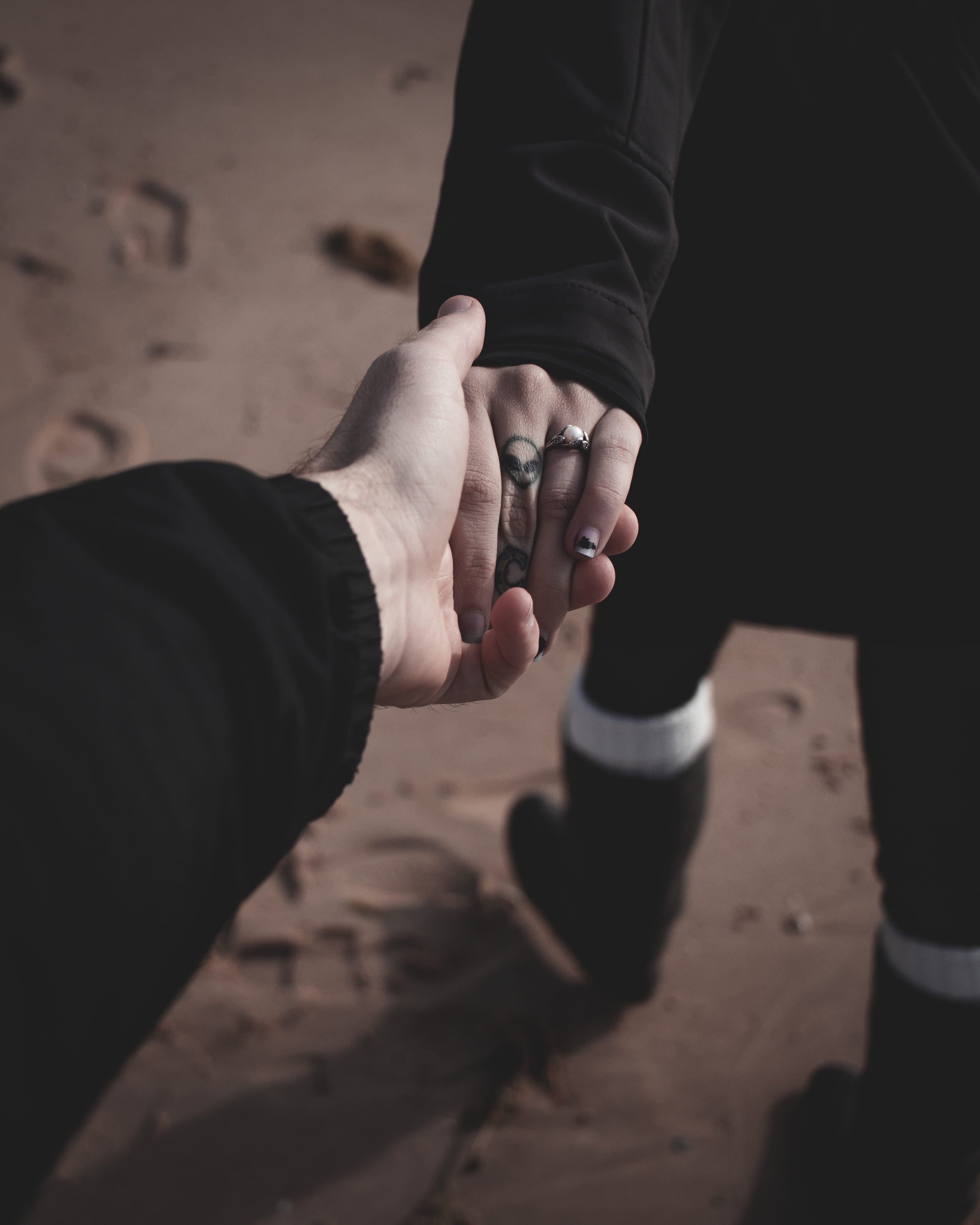 lifestyles, black, togetherness, real people, goal, footprint, couple, sand, human finger, bonding, care, ring, closeup, tattoo, outdoors, couple - relationship, Phone HD Wallpaper