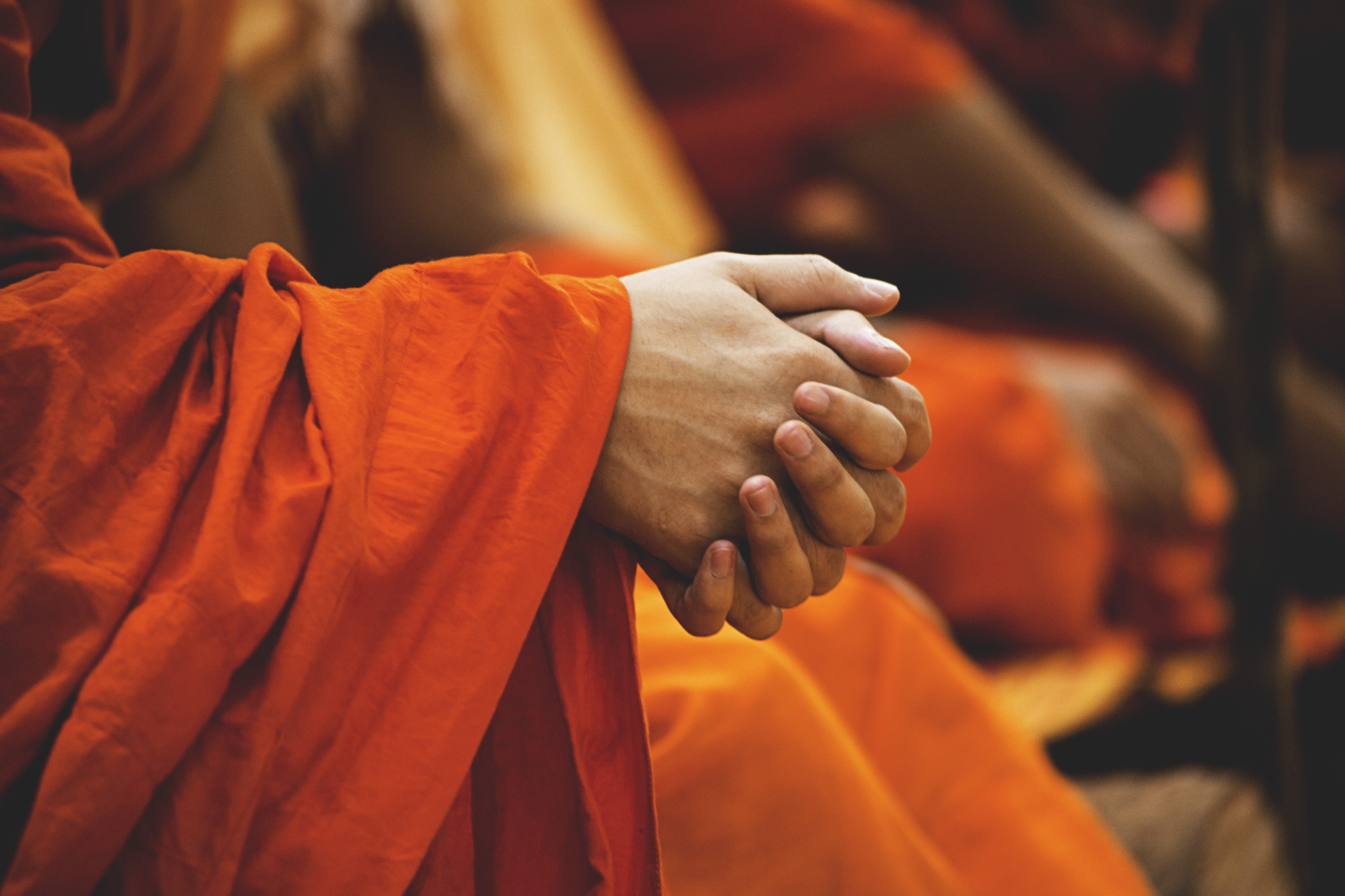 human body part, focus on foreground, ceremony, travel, belief, praying, monks, daylight, pray, garment, holding, buddhism, close-up, clasp hands, orange color, HD Wallpaper