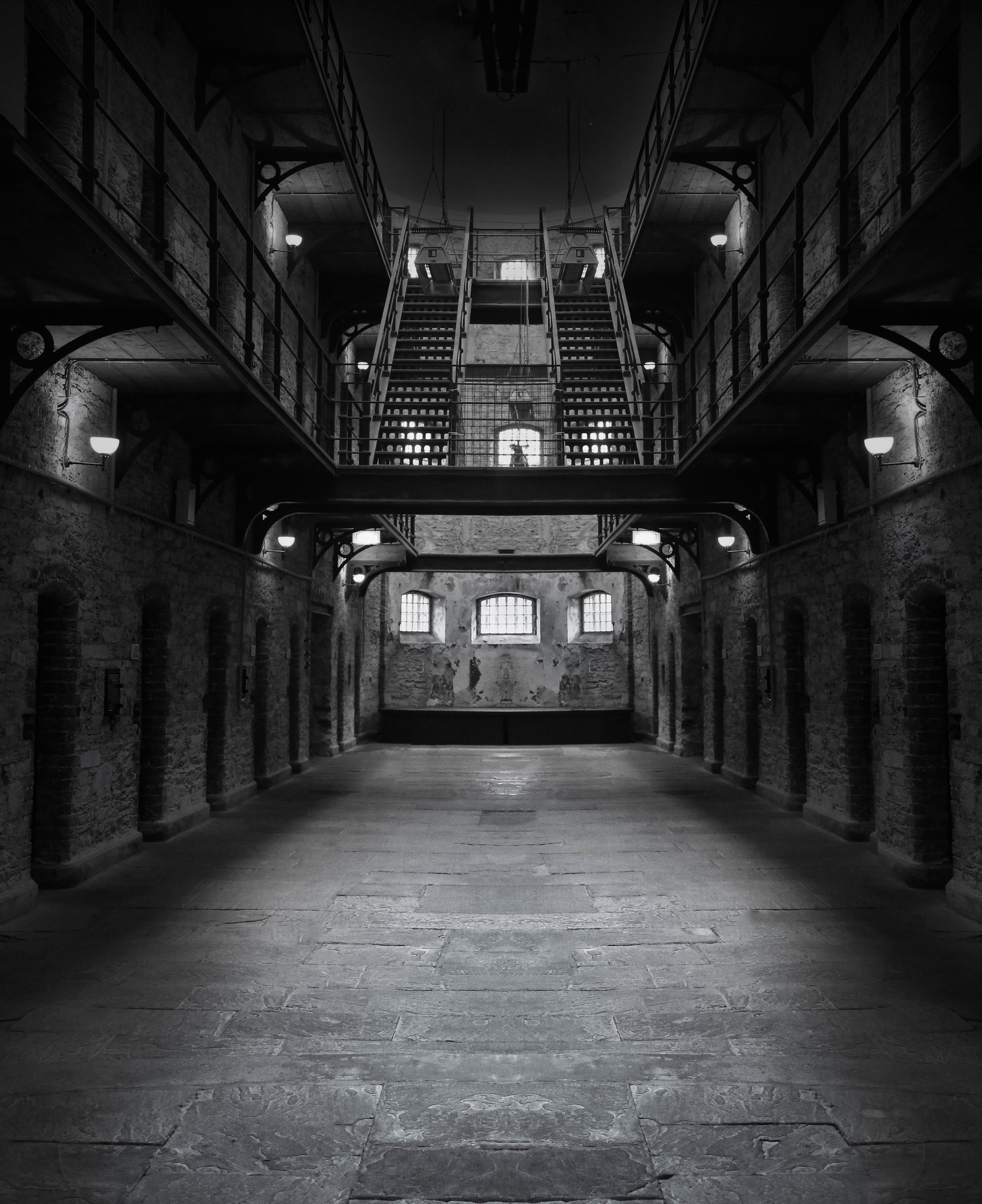 indoors, dark, in a row, diminishing perspective, empty, illuminated, gray, jail, the way forward, building, staircase, prison, no people, built structure, Phone HD Wallpaper
