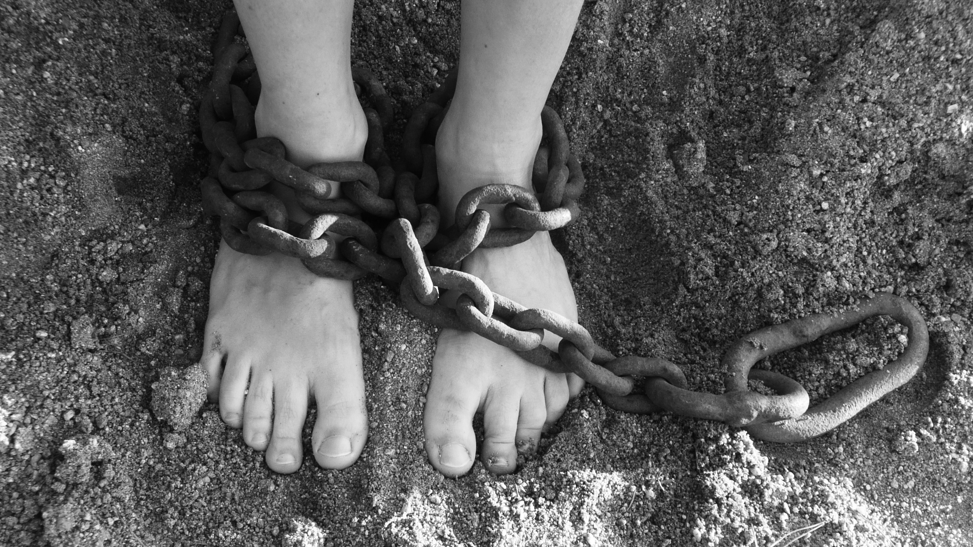 togetherness, prisoner, land, restraining, kidnapping, two people, lock, real people, person, bondage, dirty, captivity, enslave, prison, grayscale, sand, HD Wallpaper