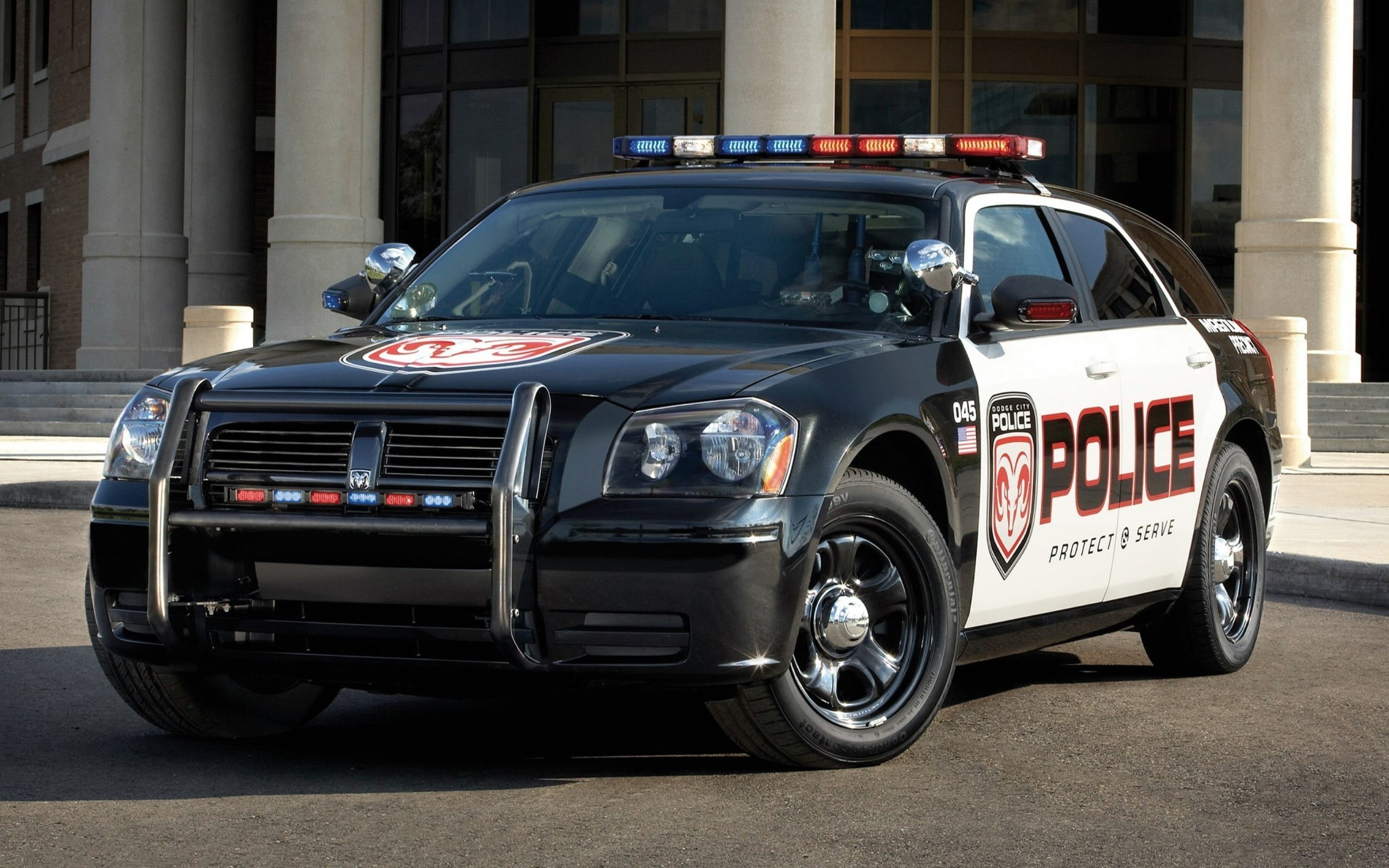 building exterior, street, travel, city, day, built structure, 2K, land vehicle, road, no people, Dodge Magnum, police cars, retro styled, architecture, HD Wallpaper