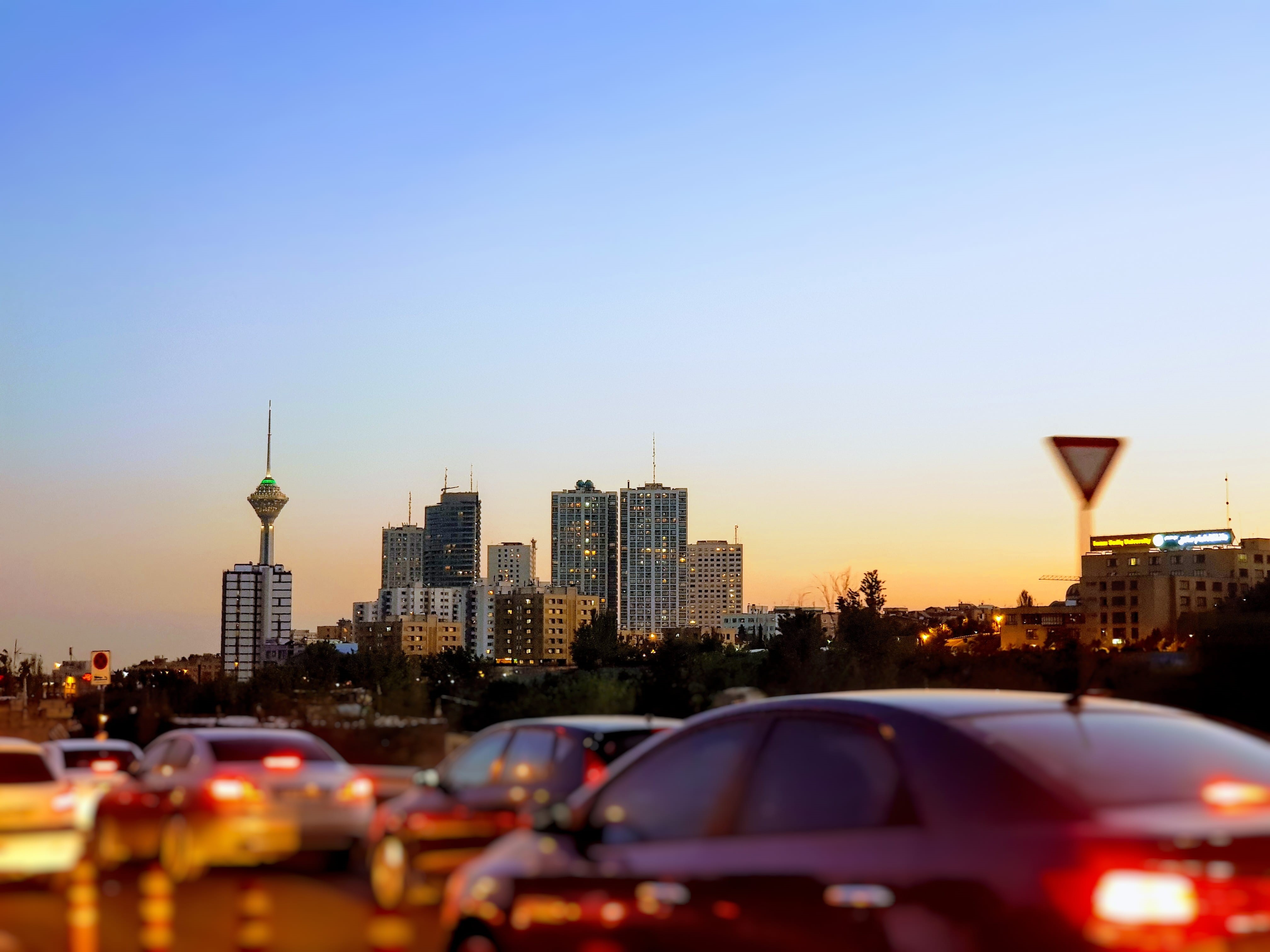 gharb, mode of transportation, architecture, iran, building, motor vehicle, roadside, near, tehran, tall - high, road, sundown, building exterior, traff, HD Wallpaper
