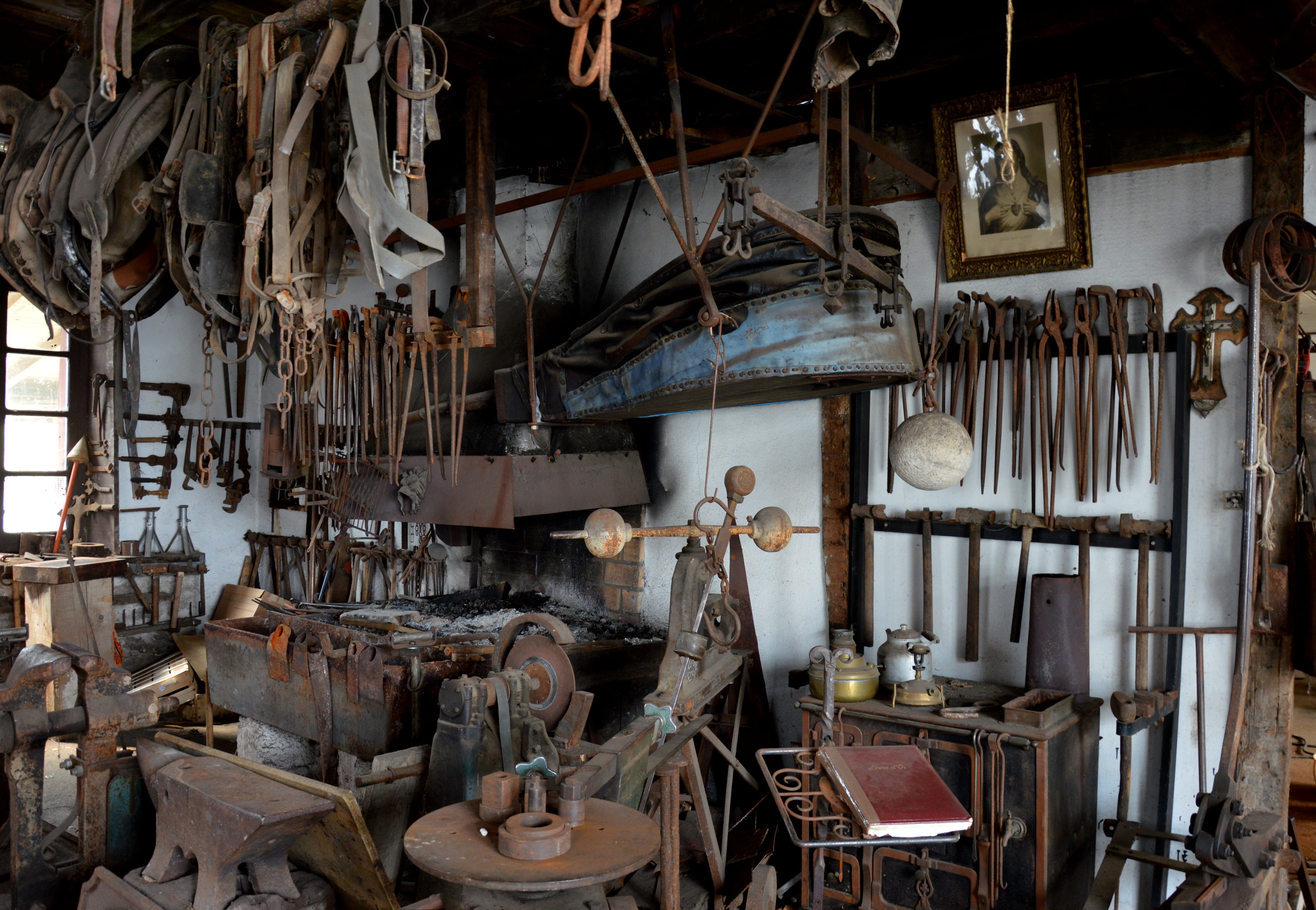 workshop, hanging, wrought iron, no people, day, variation, anvil, indoors, the past, history, forge, work tool, industry, choice, abundance, obsolete, HD Wallpaper