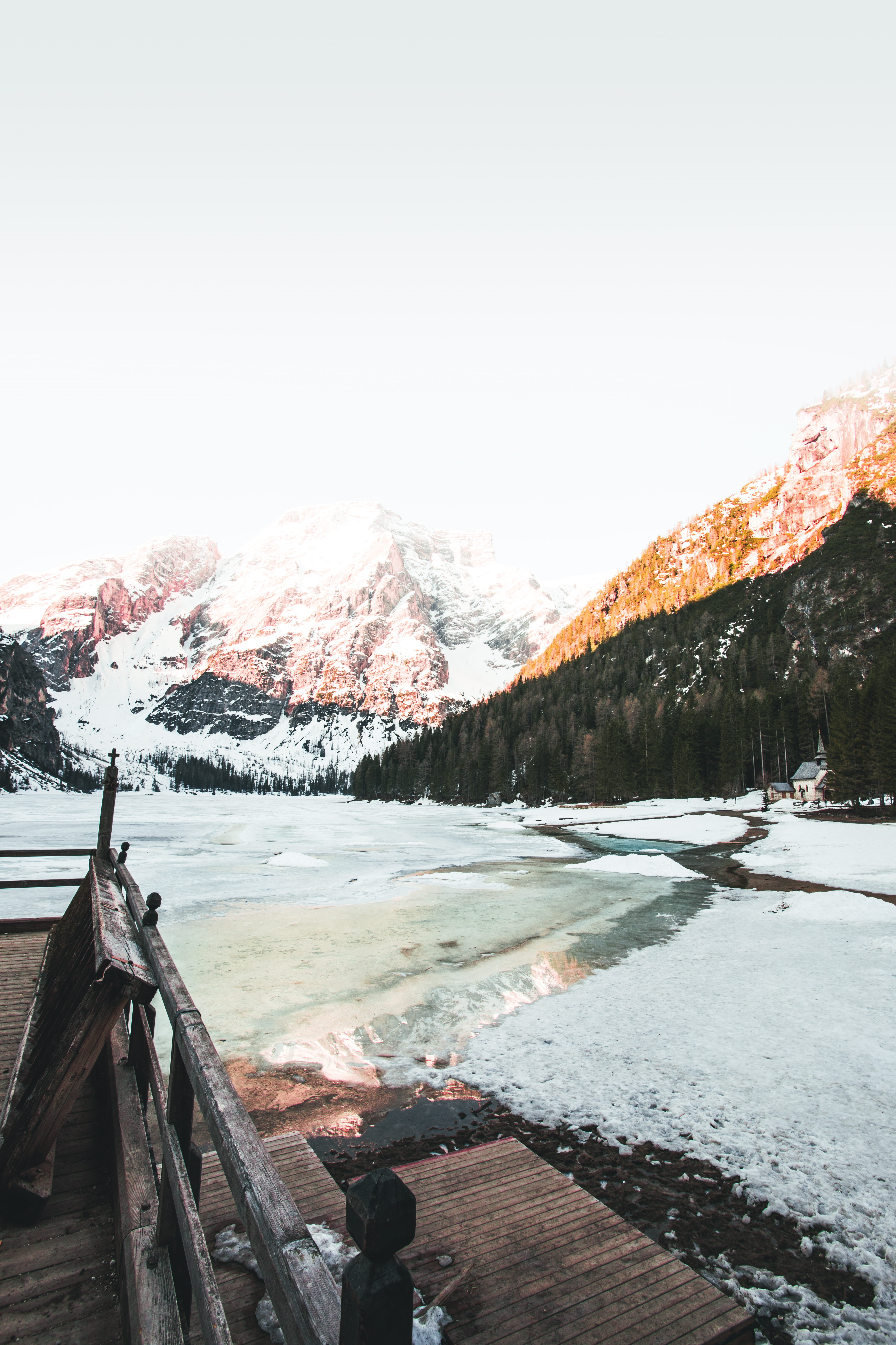 tree, bridge, non-urban scene, beauty in nature, snow, lake, ridge, sky, landscape, 5K, glow, pragser wildsee, day, glacier, mountain range, cold temperature, Phone HD Wallpaper