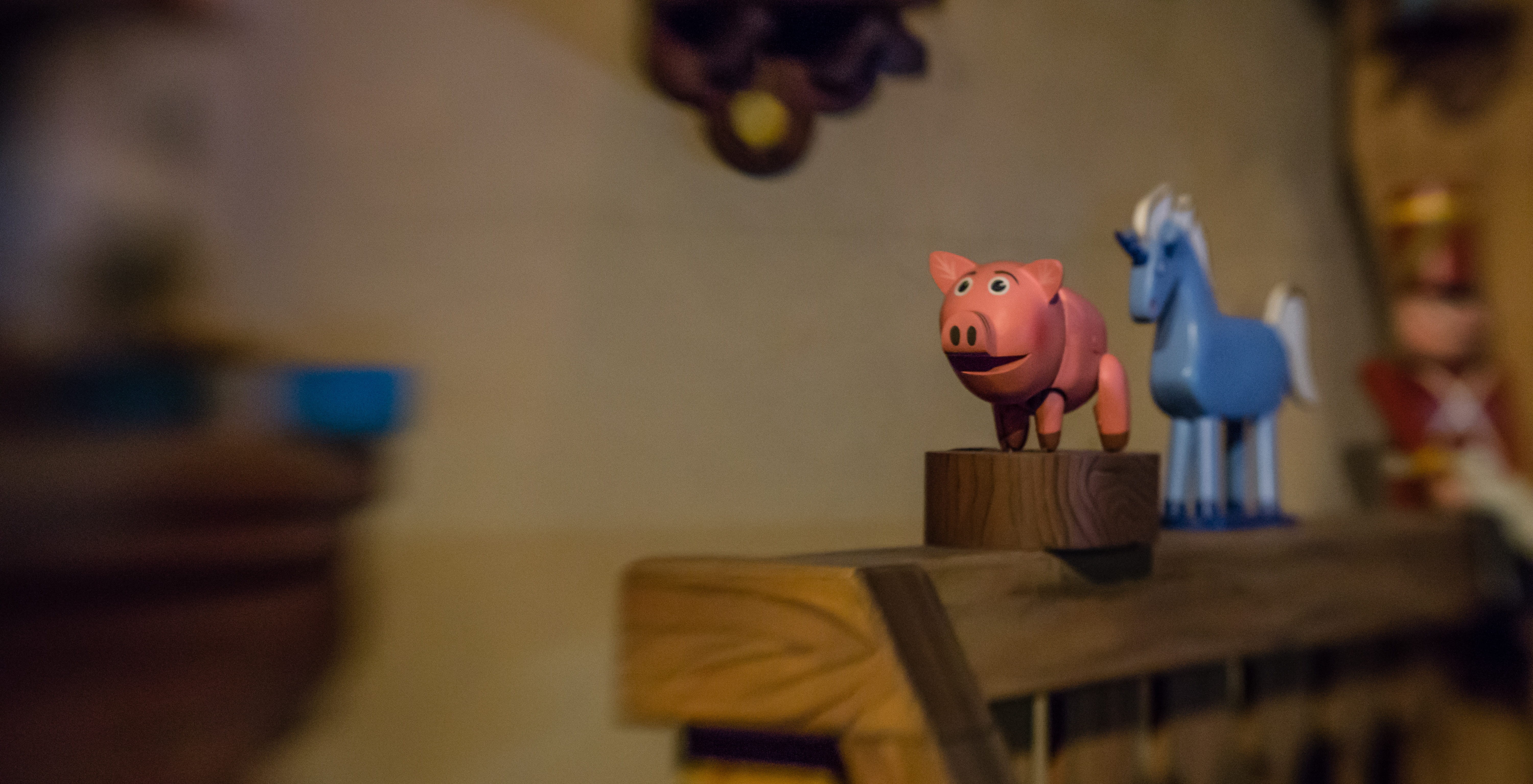 wood - material, toy, craft, ceramics, animal, animal themes, selective focus, representation, indoors, focus on foreground, business, pig, 5K, ride, seat, HD Wallpaper