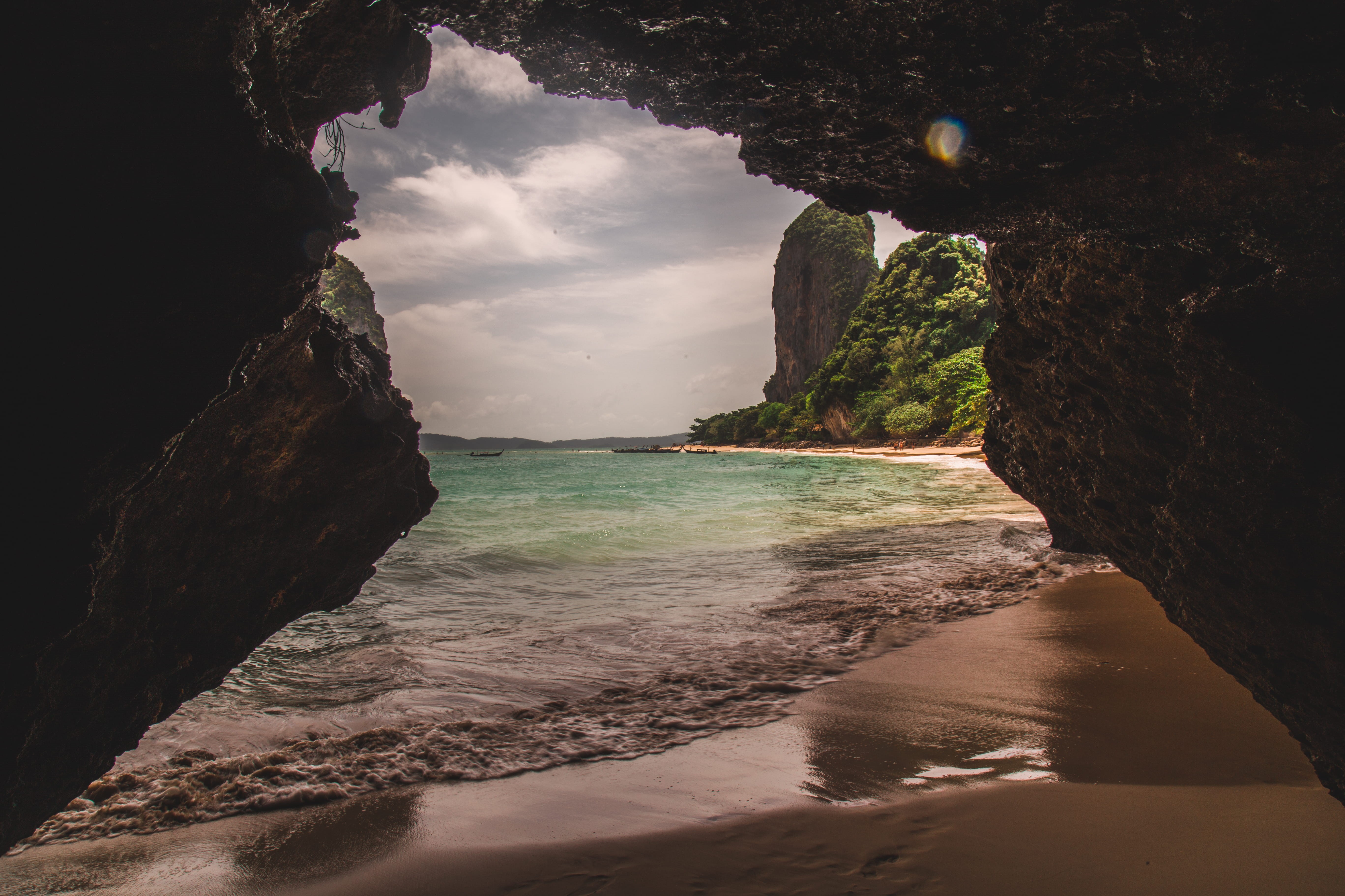 cave interior, near, land, railay beach, stack rock, dirt road, sky, boat, tranquility, forest, rock formation, explore, sand, beach, scenics - nature, HD Wallpaper