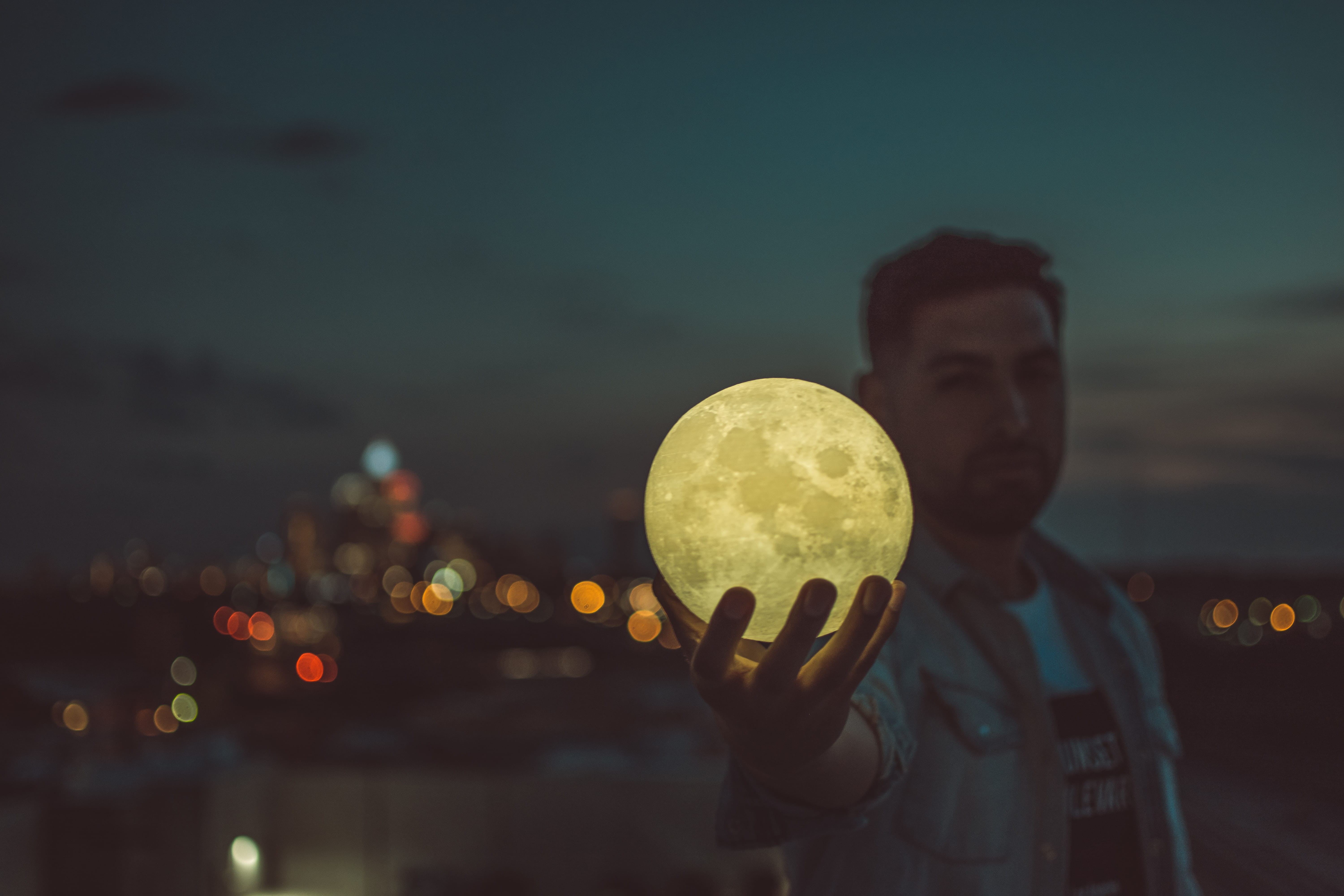person, one person, lifestyles, egg, yellow, human, sky, city, focus on foreground, brittani burns photography, space, dusk, leisure activity, city lights, HD Wallpaper