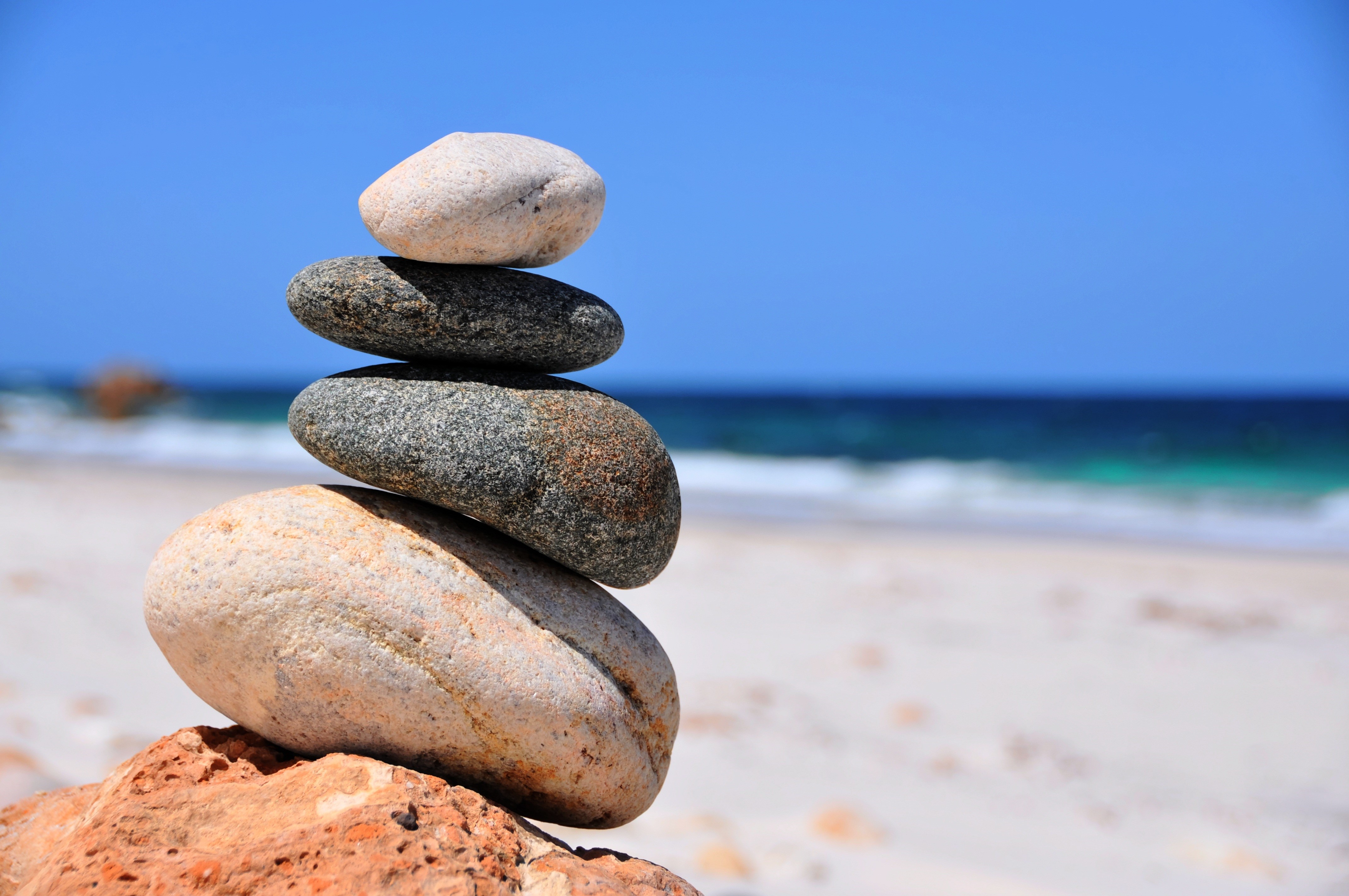 rocks, arrangement, outdoors, heap, 4K, stability, pebble, tranquil Scene, stone - Object, rock, sand, coastline, stone, stack, stones, relaxation, sky, HD Wallpaper