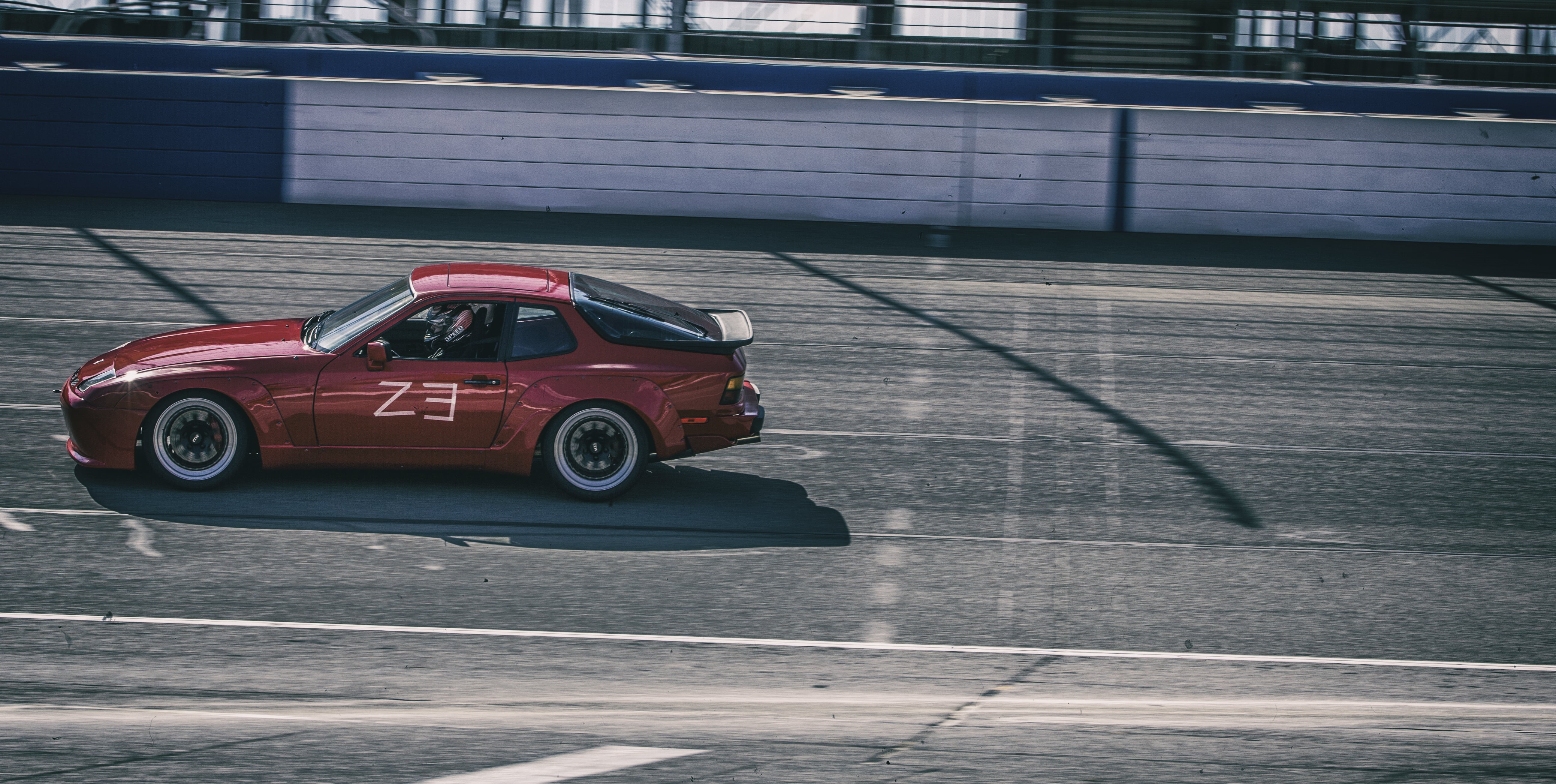 porsche 944, day, sunlight, road, high angle view, outdoors, transportation, 5K, red, mode of transportation, railing, no people, motor vehicle, city, HD Wallpaper