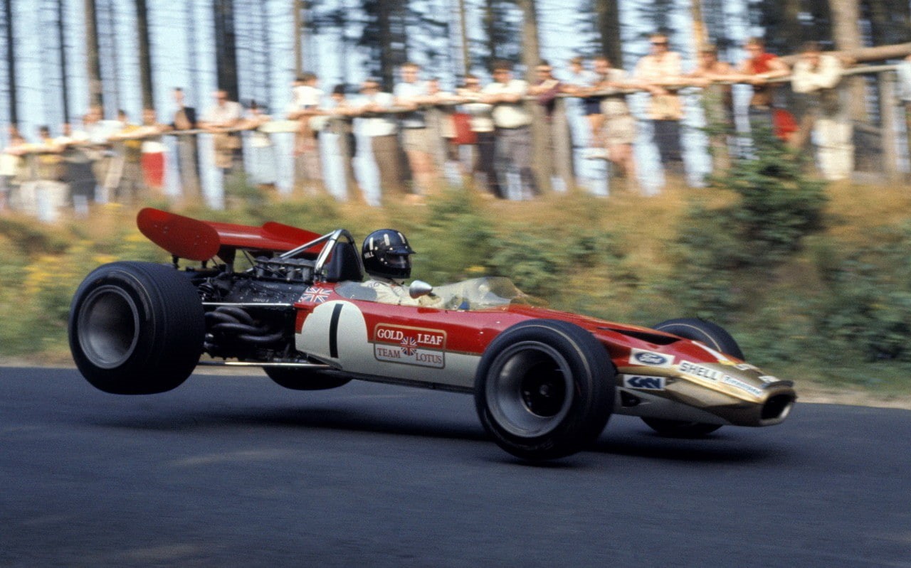 no people, technology, number, Formula 1, Lotus, red, day, transportation, tree, motion, racing, protection, classic car, speed, blurred motion, 720P, HD Wallpaper