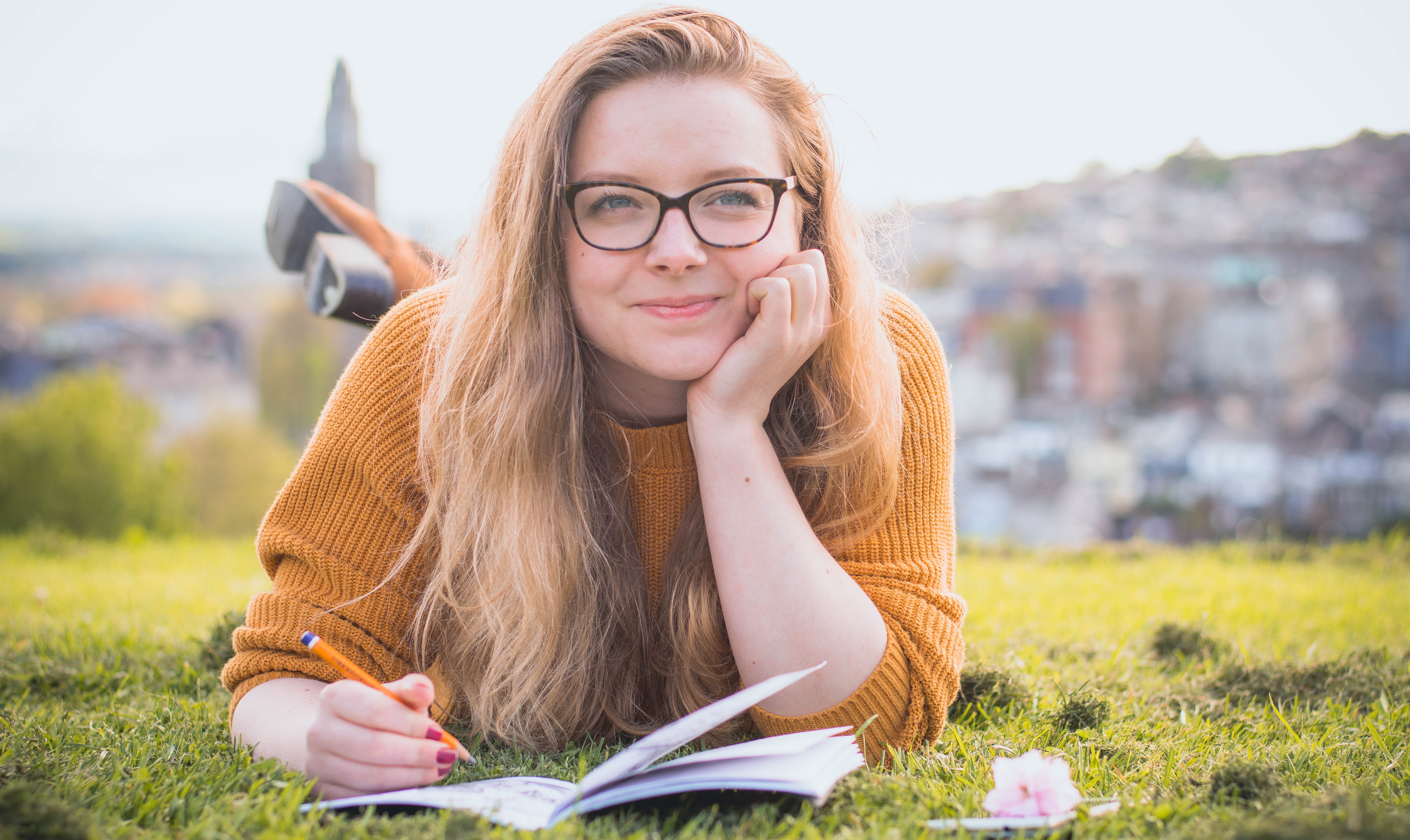 architecture, eyeglasses, enjoyment, grass, one person, leisure, pencil, outdoors, sit, smile, young adult, college, glasses, fashion, casual, care, headshot, HD Wallpaper